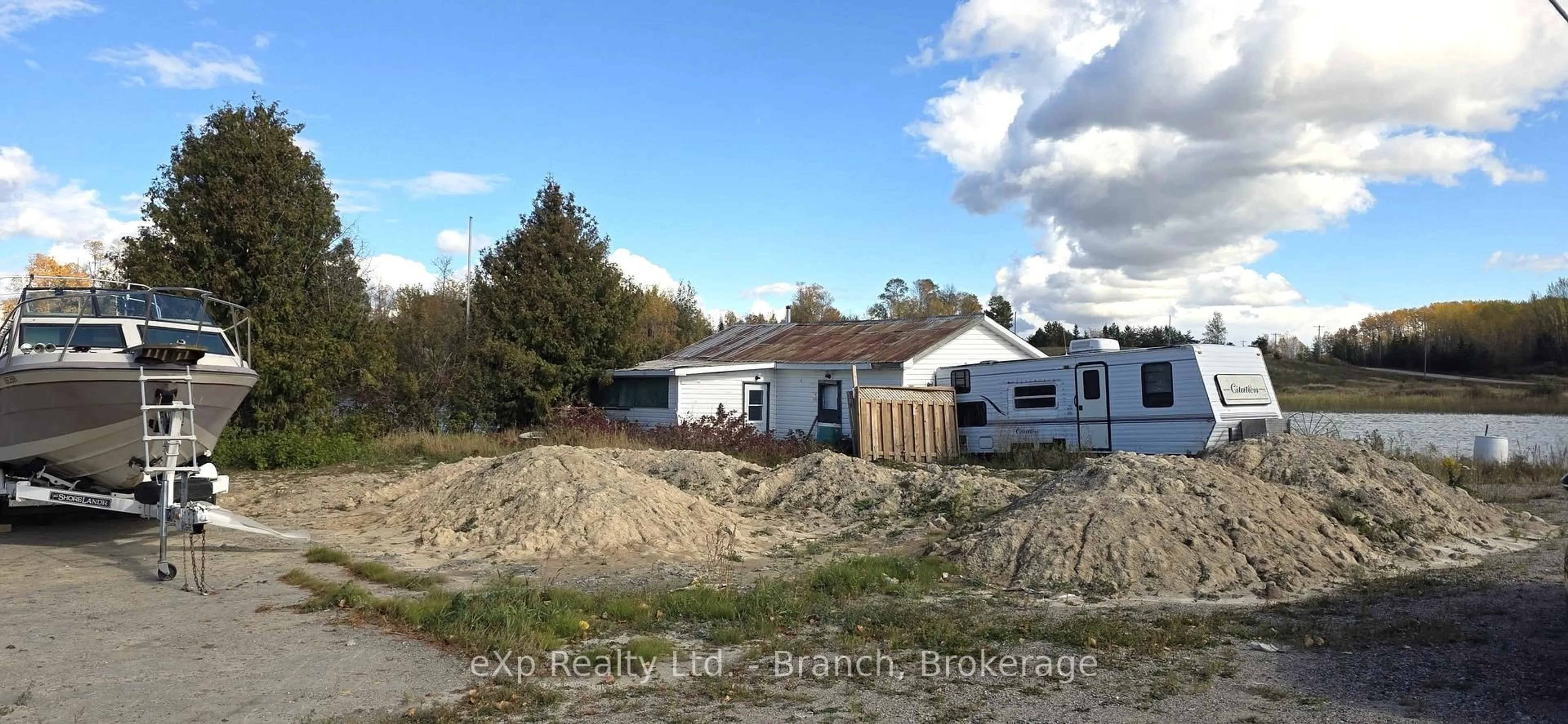 A pic from outside/outdoor area/front of a property/back of a property/a pic from drone, building for 7650 7650 FREDERICK HOUSE LAKE Rd, Timmins Ontario P0N 1A0