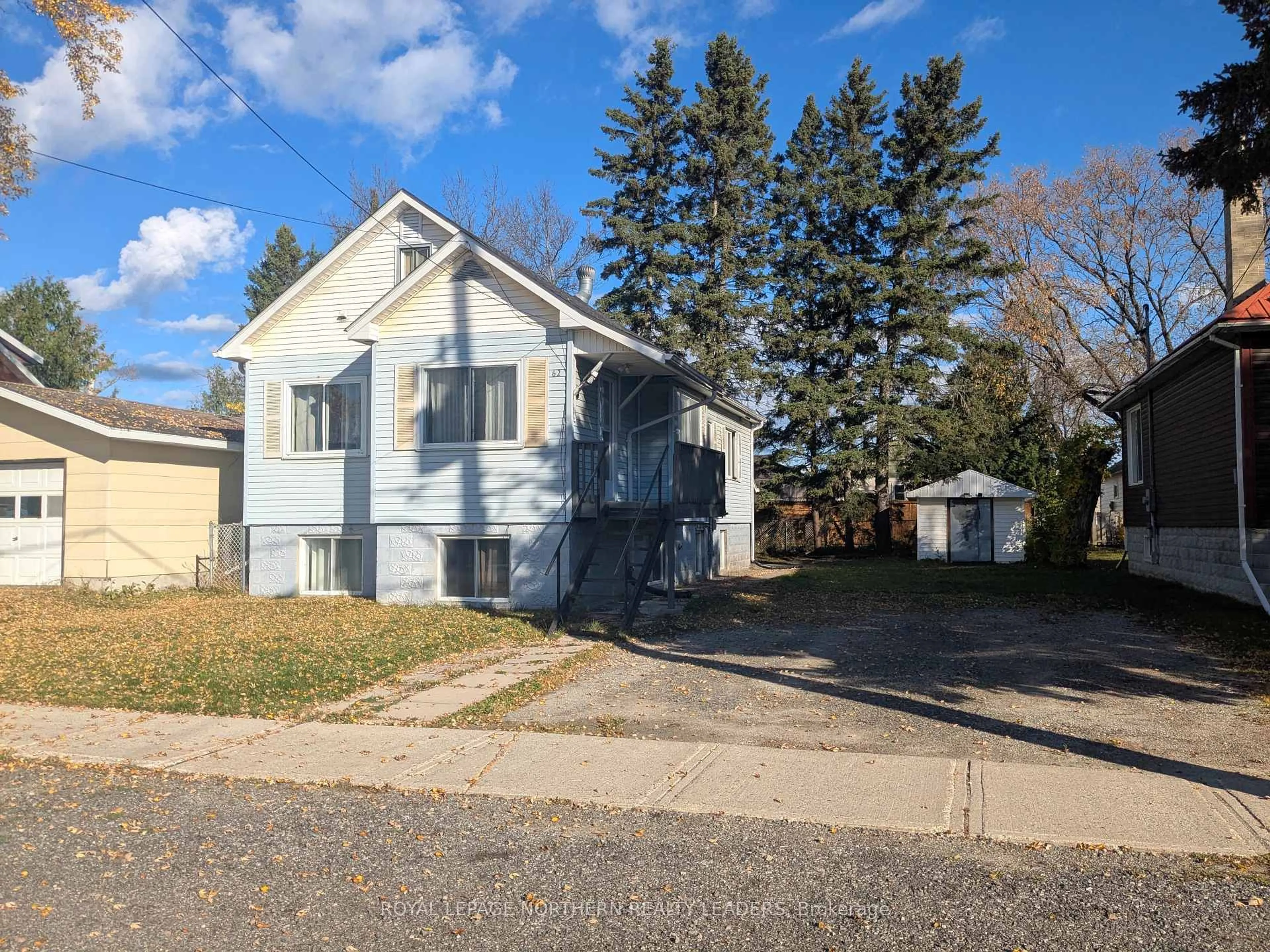 A pic from outside/outdoor area/front of a property/back of a property/a pic from drone, street for 62 Powell Ave, Timmins Ontario P0N 1H0