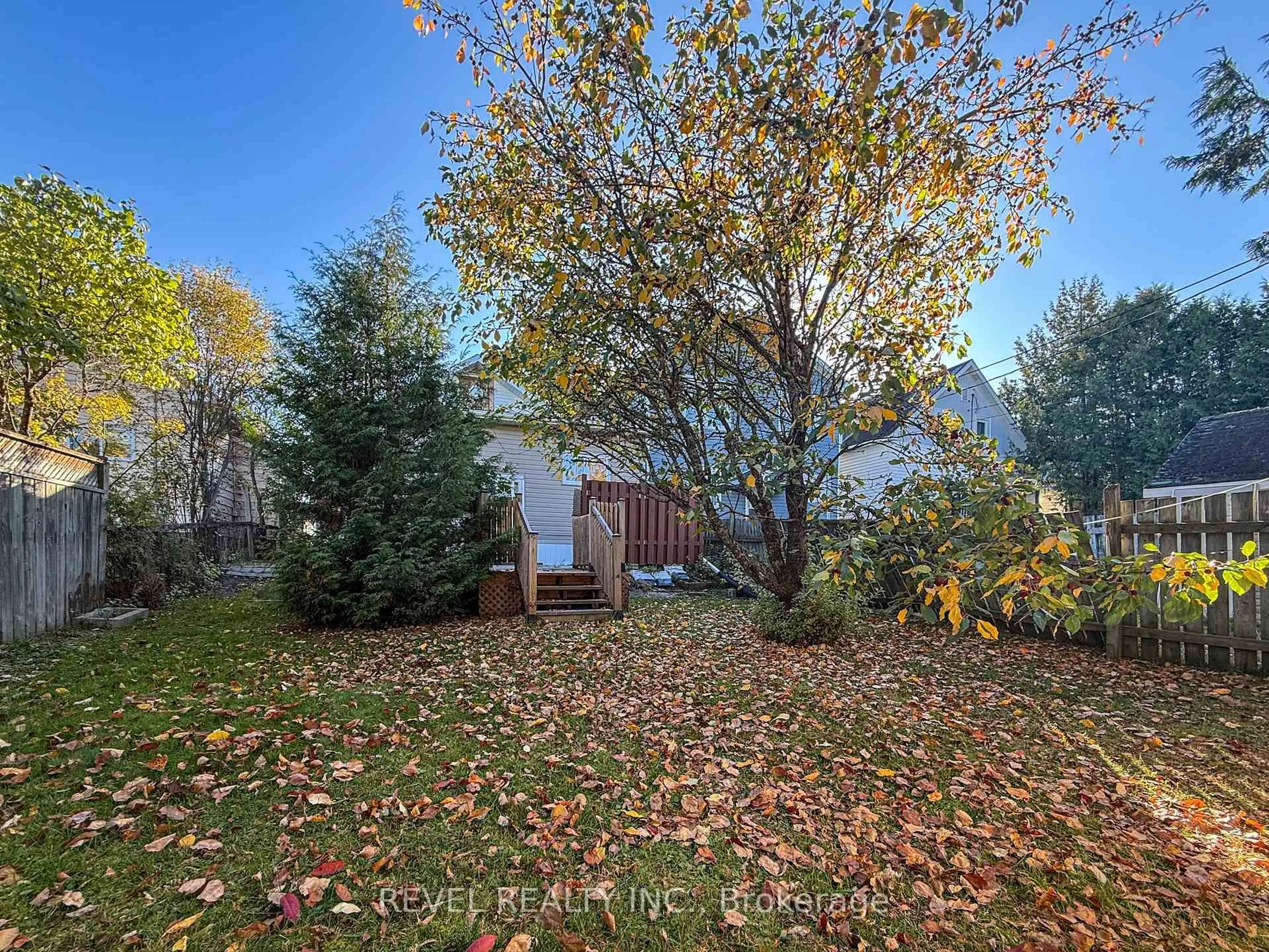 A pic from outside/outdoor area/front of a property/back of a property/a pic from drone, forest/trees view for 223 Cherry St, Timmins Ontario P4N 6W3