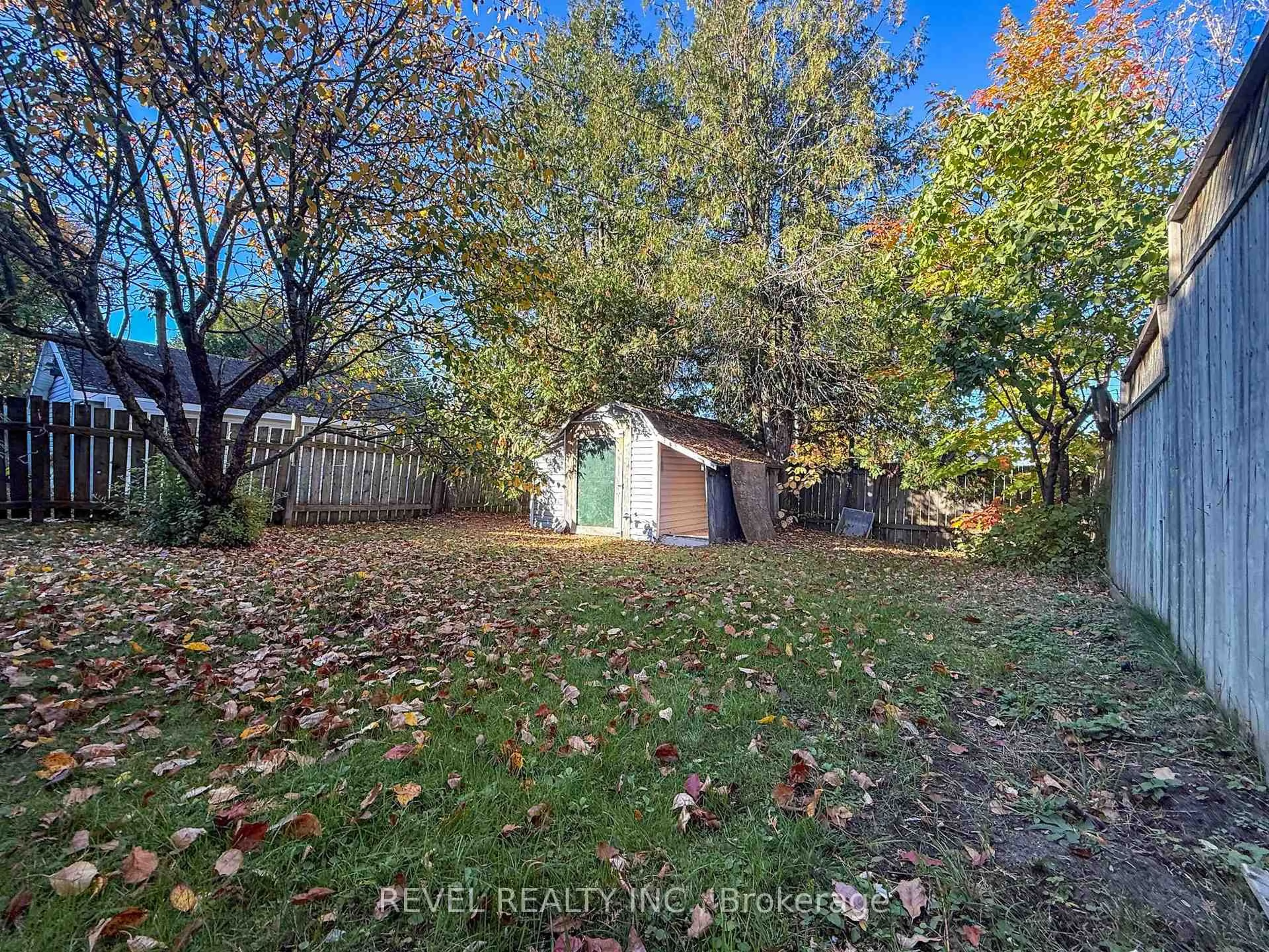 A pic from outside/outdoor area/front of a property/back of a property/a pic from drone, forest/trees view for 223 Cherry St, Timmins Ontario P4N 6W3