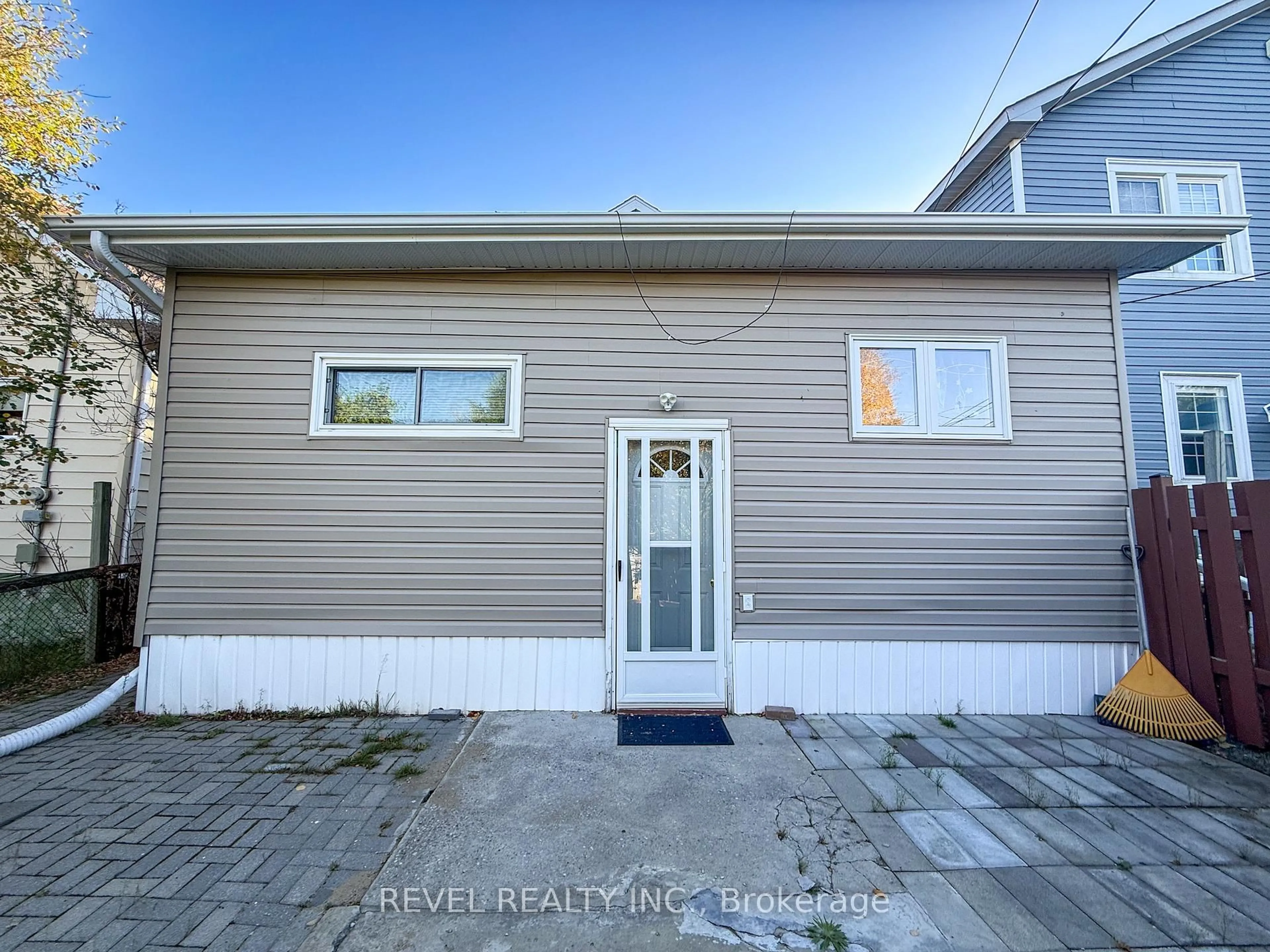 Home with vinyl exterior material, street for 223 Cherry St, Timmins Ontario P4N 6W3