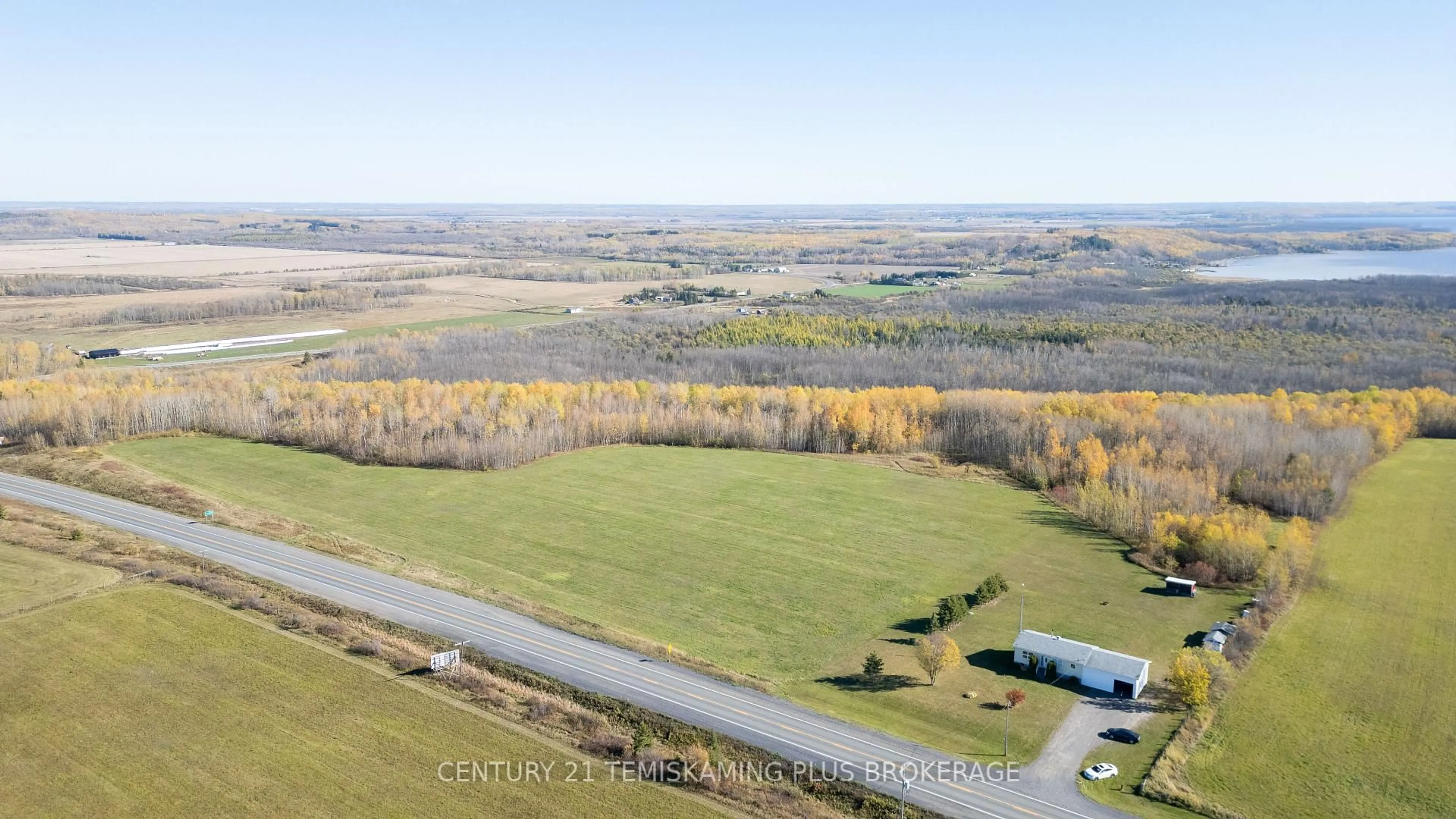 A pic from outside/outdoor area/front of a property/back of a property/a pic from drone, water/lake/river/ocean view for 882358 Highway 65, Timiskaming Ontario P0J 1P0