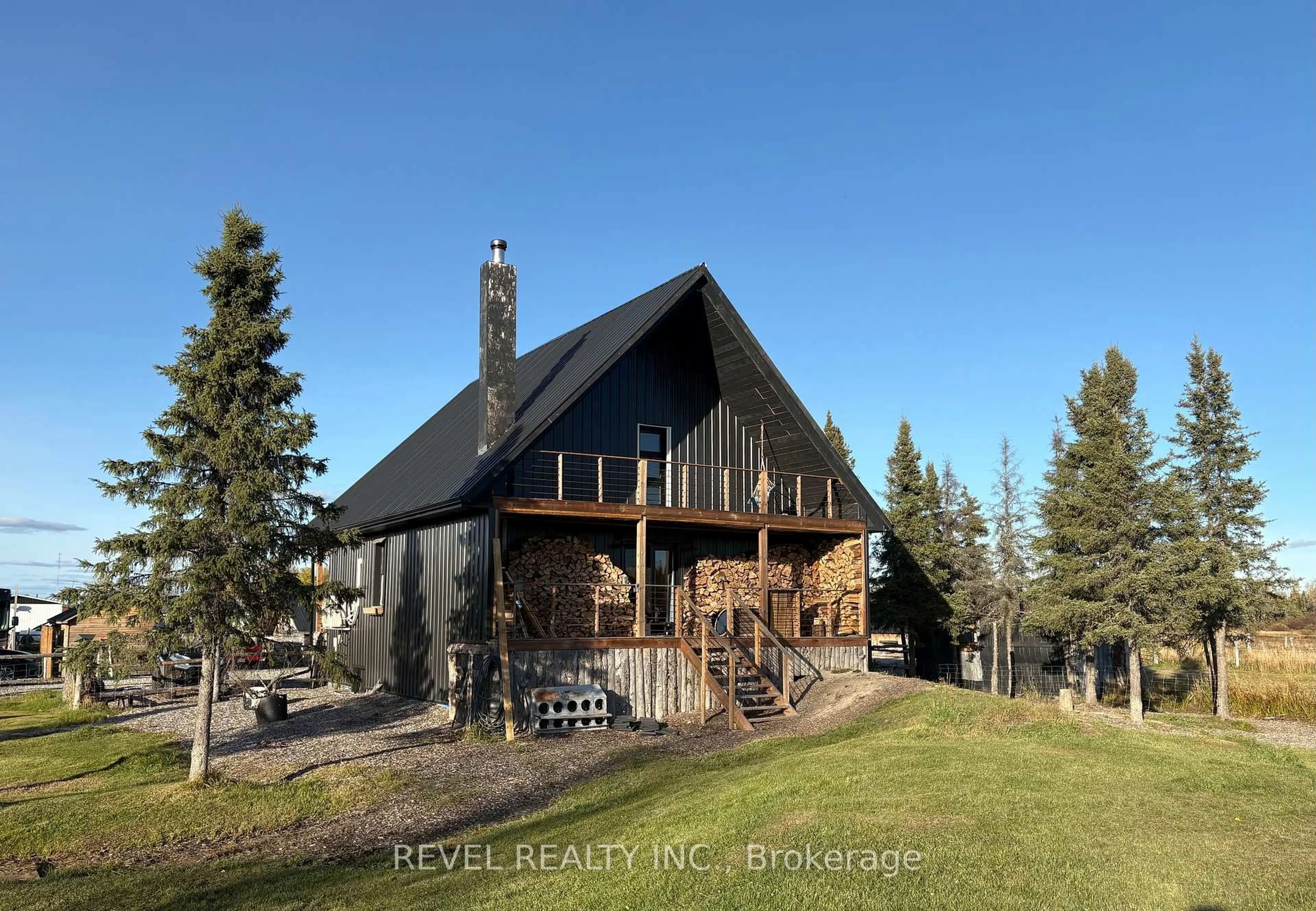 A pic from outside/outdoor area/front of a property/back of a property/a pic from drone, unknown for 680 Peltola Rd, Cochrane Ontario P0L 1C0