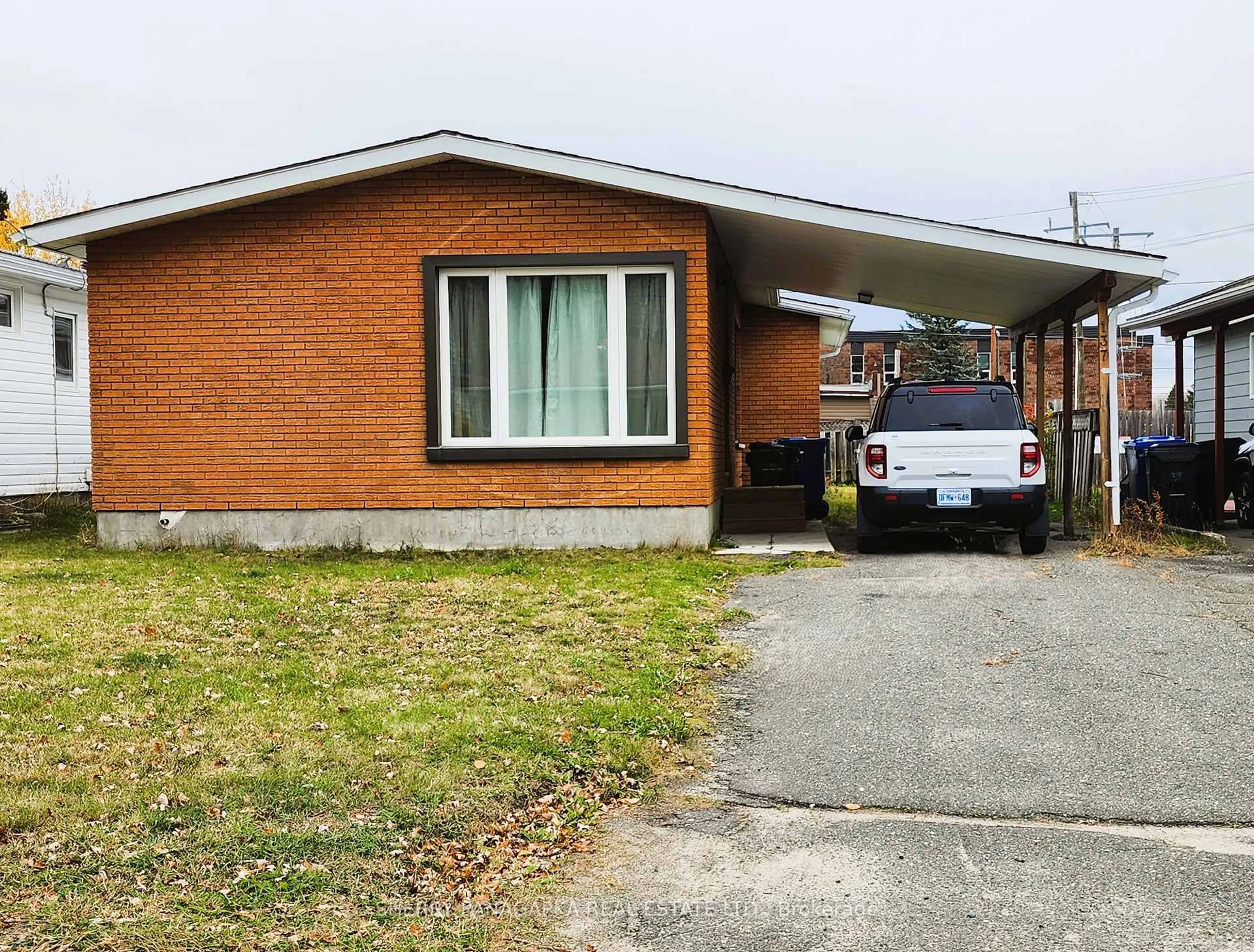 Home with brick exterior material, street for 137 Main St, Kirkland Lake Ontario P2N 3G2