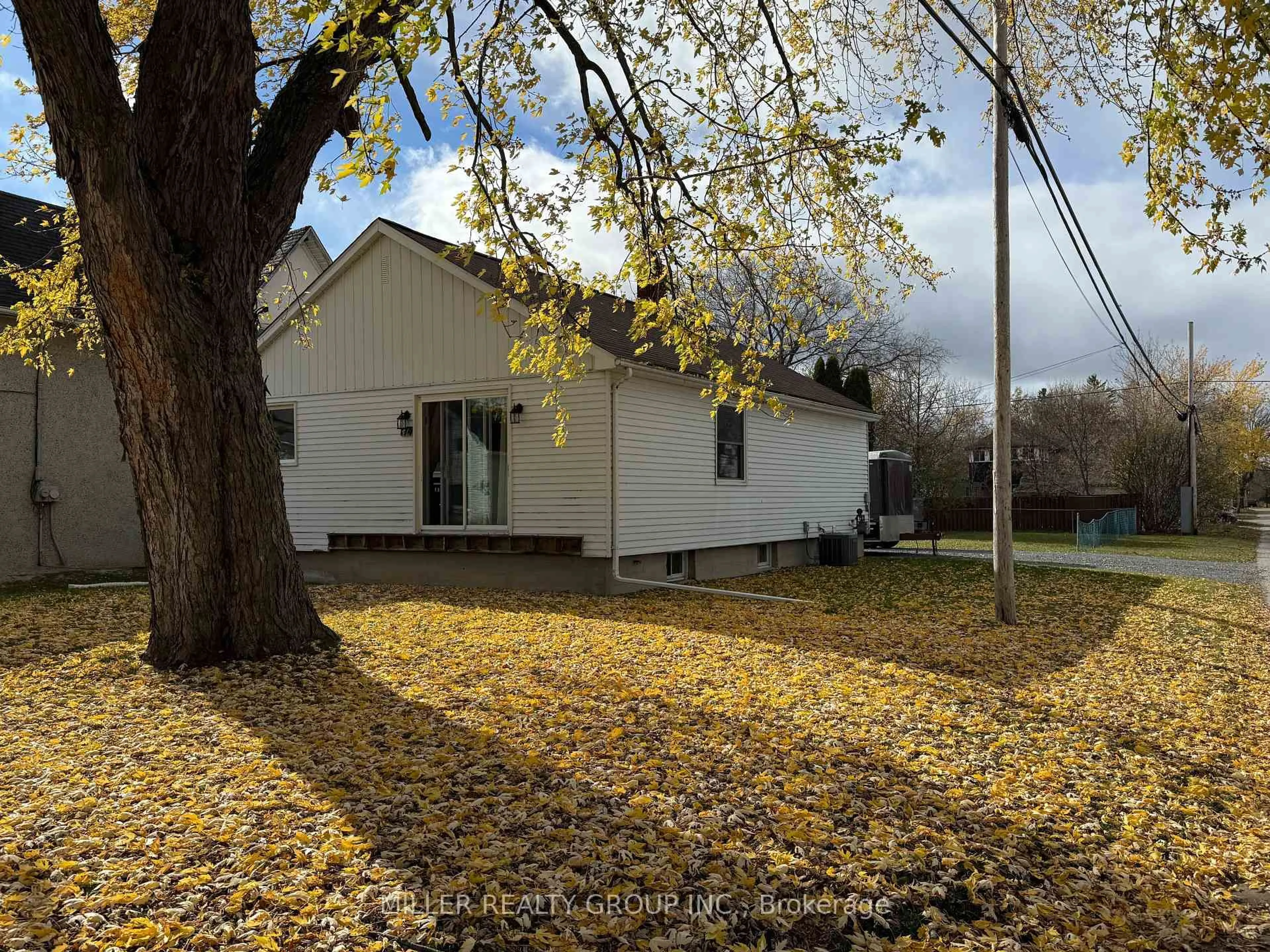 A pic from outside/outdoor area/front of a property/back of a property/a pic from drone, street for 174 Rebecca St, Temiskaming Shores Ontario P0J 1P0