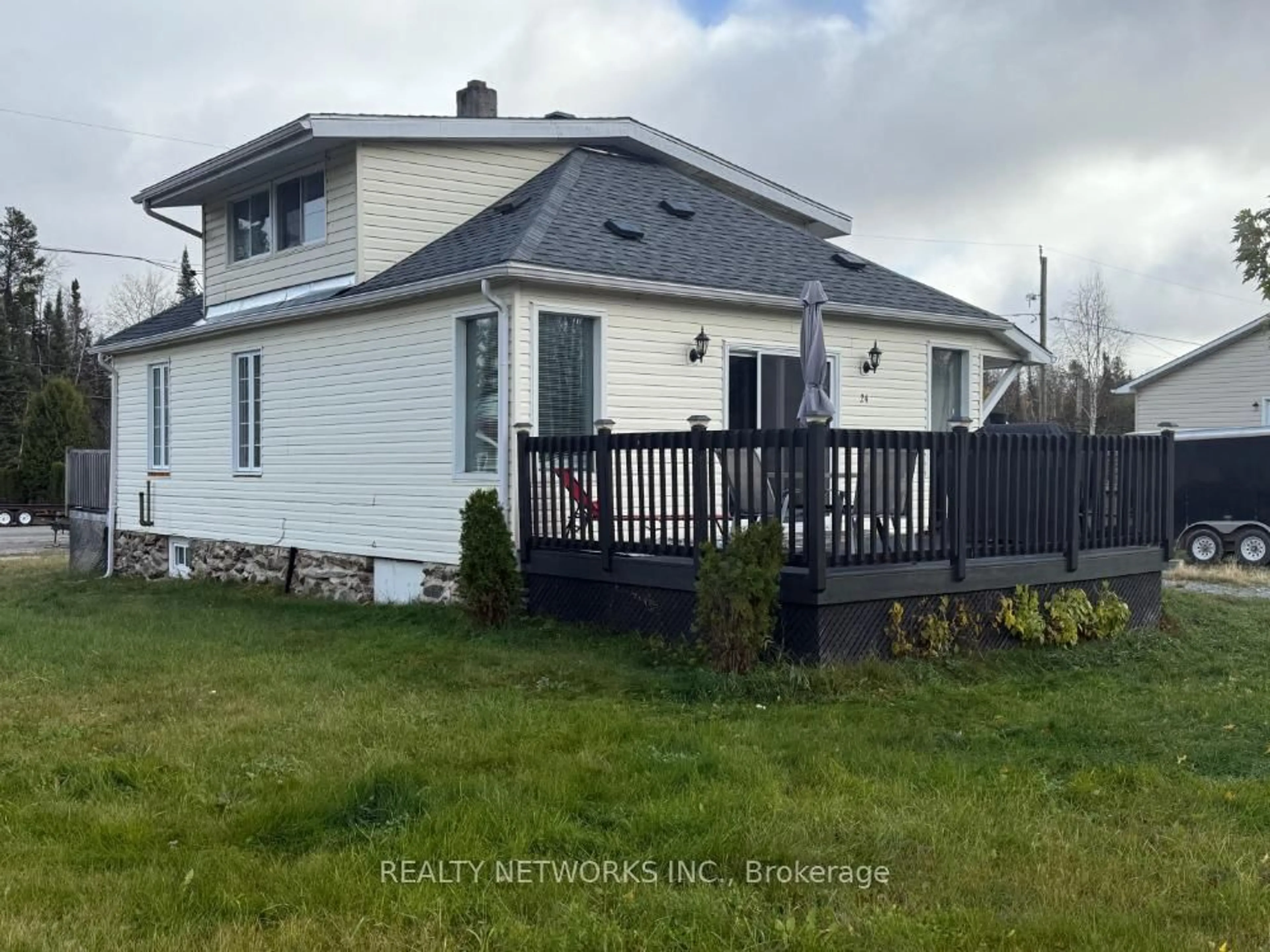 A pic from outside/outdoor area/front of a property/back of a property/a pic from drone, unknown for 24 Hazelnut St, Timmins Ontario P4N 7C2