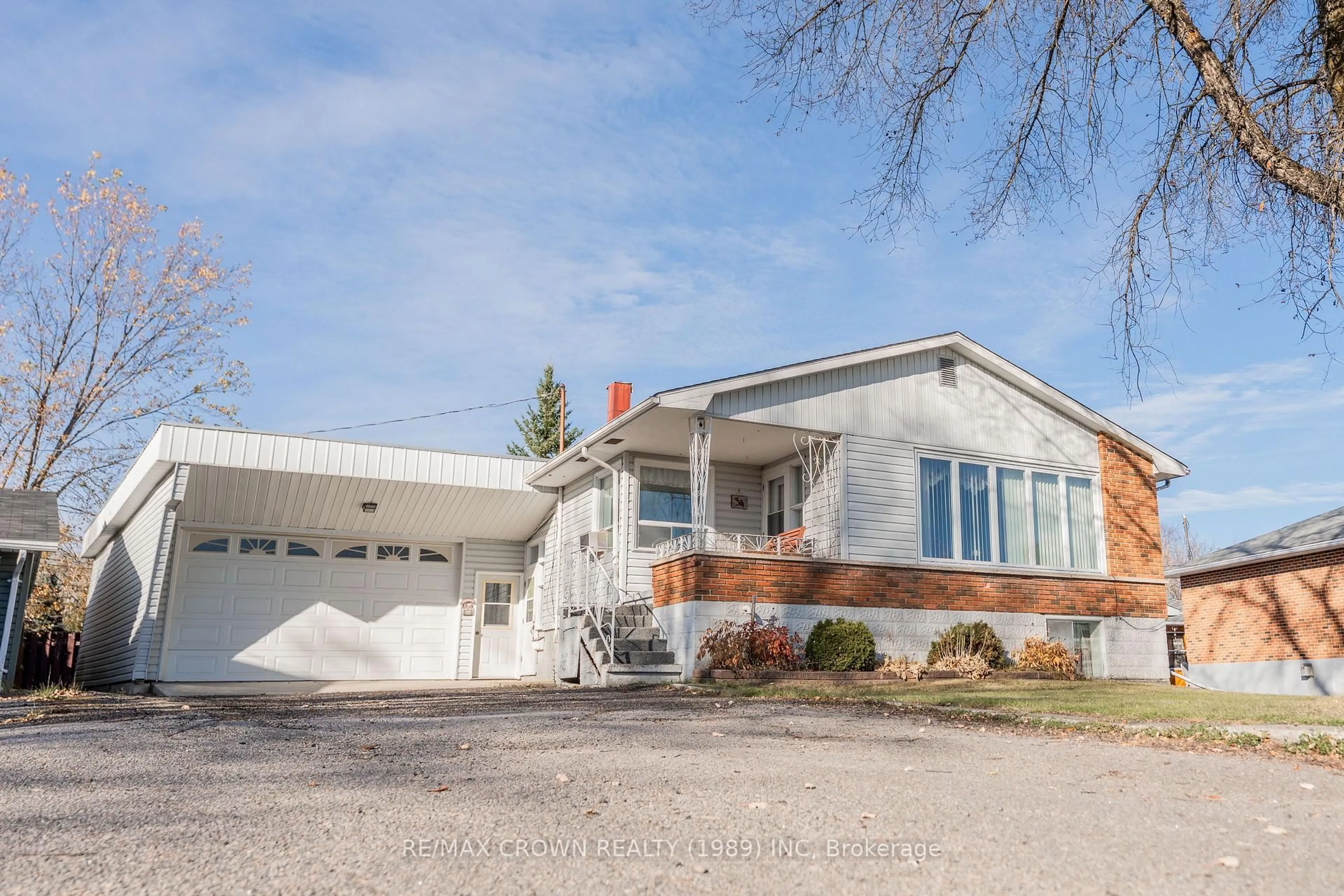 Home with brick exterior material, street for 34 Maple Dr, Kapuskasing Ontario P5N 2A6