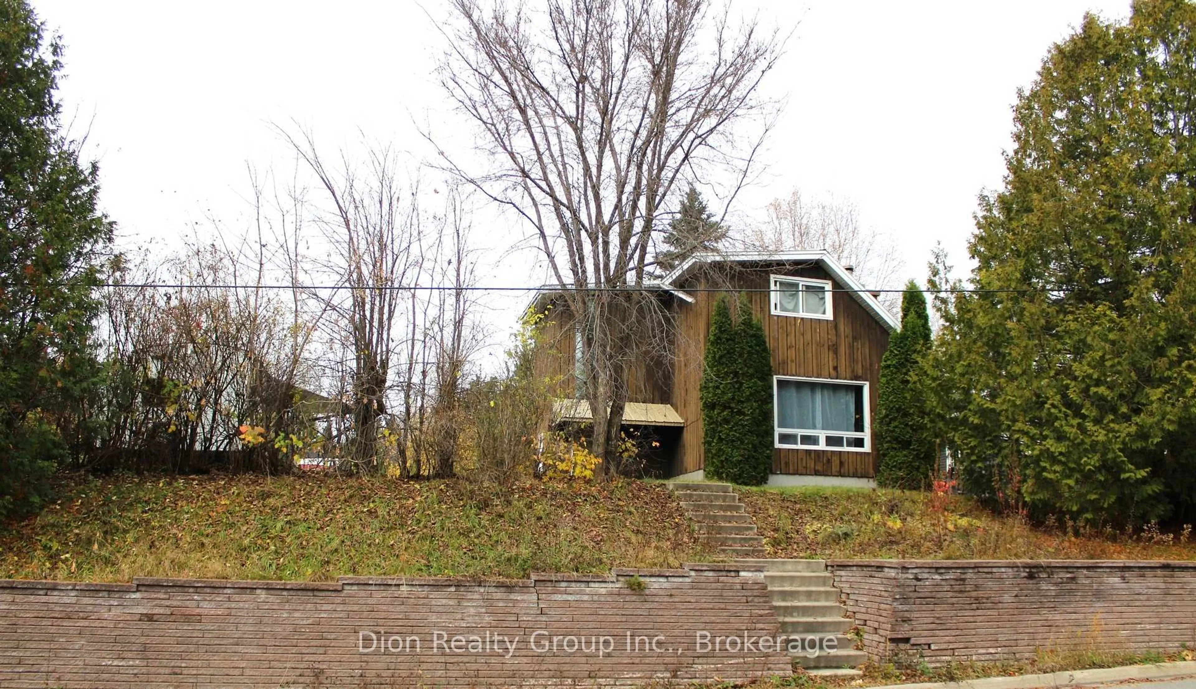 A pic from outside/outdoor area/front of a property/back of a property/a pic from drone, street for 63 Riverside Dr, Kirkland Lake Ontario P0K 1T0