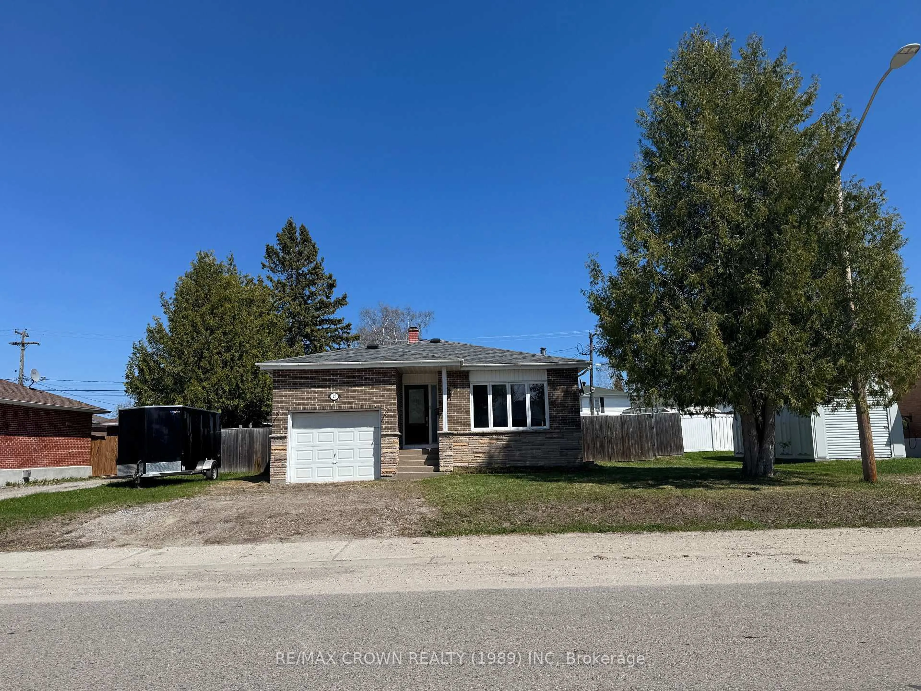 Home with brick exterior material, street for 27 Ottawa St, Kapuskasing Ontario P5N 1Y6