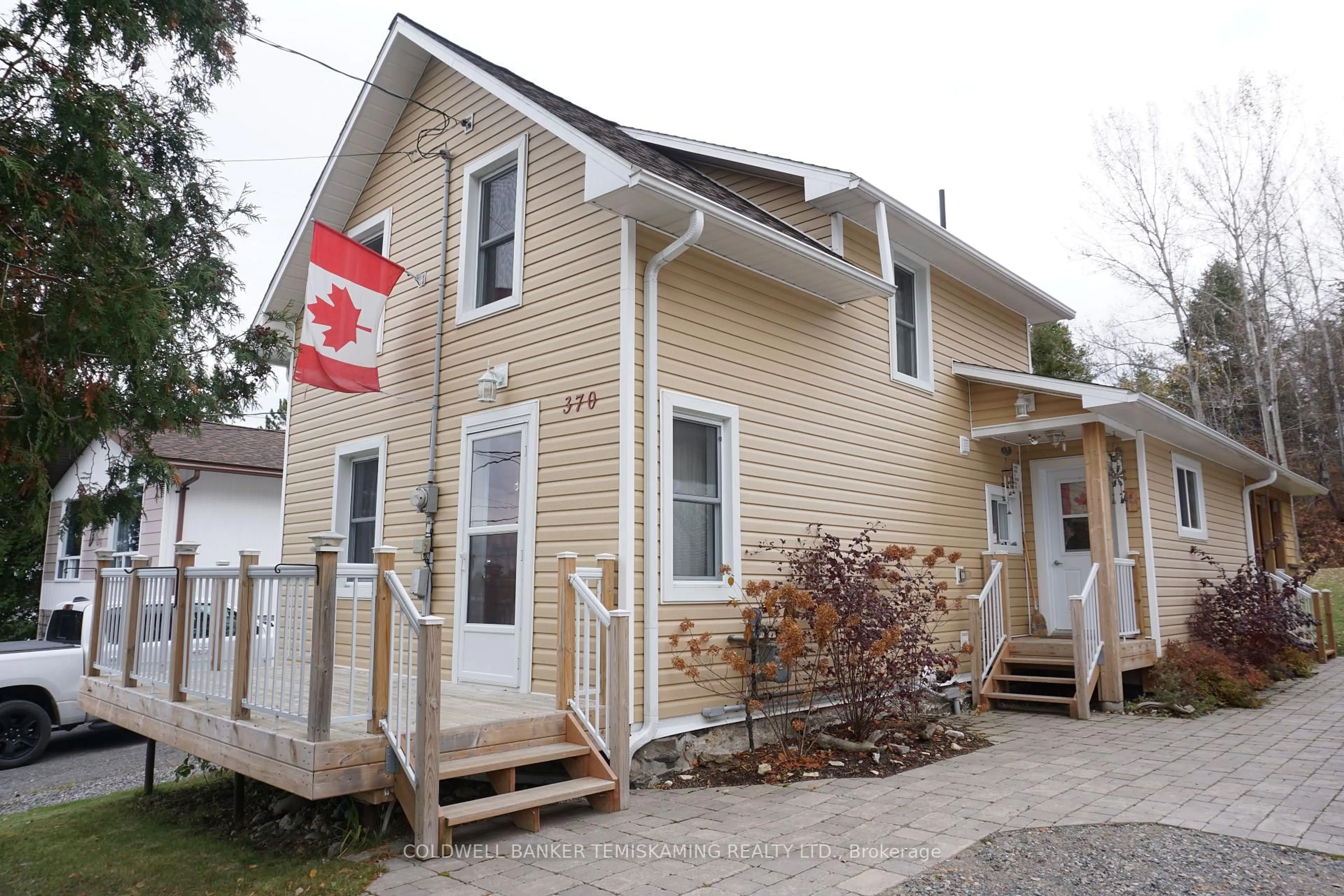 Home with vinyl exterior material, street for 370 Agnes Ave, Temiskaming Shores Ontario P0J 1P0
