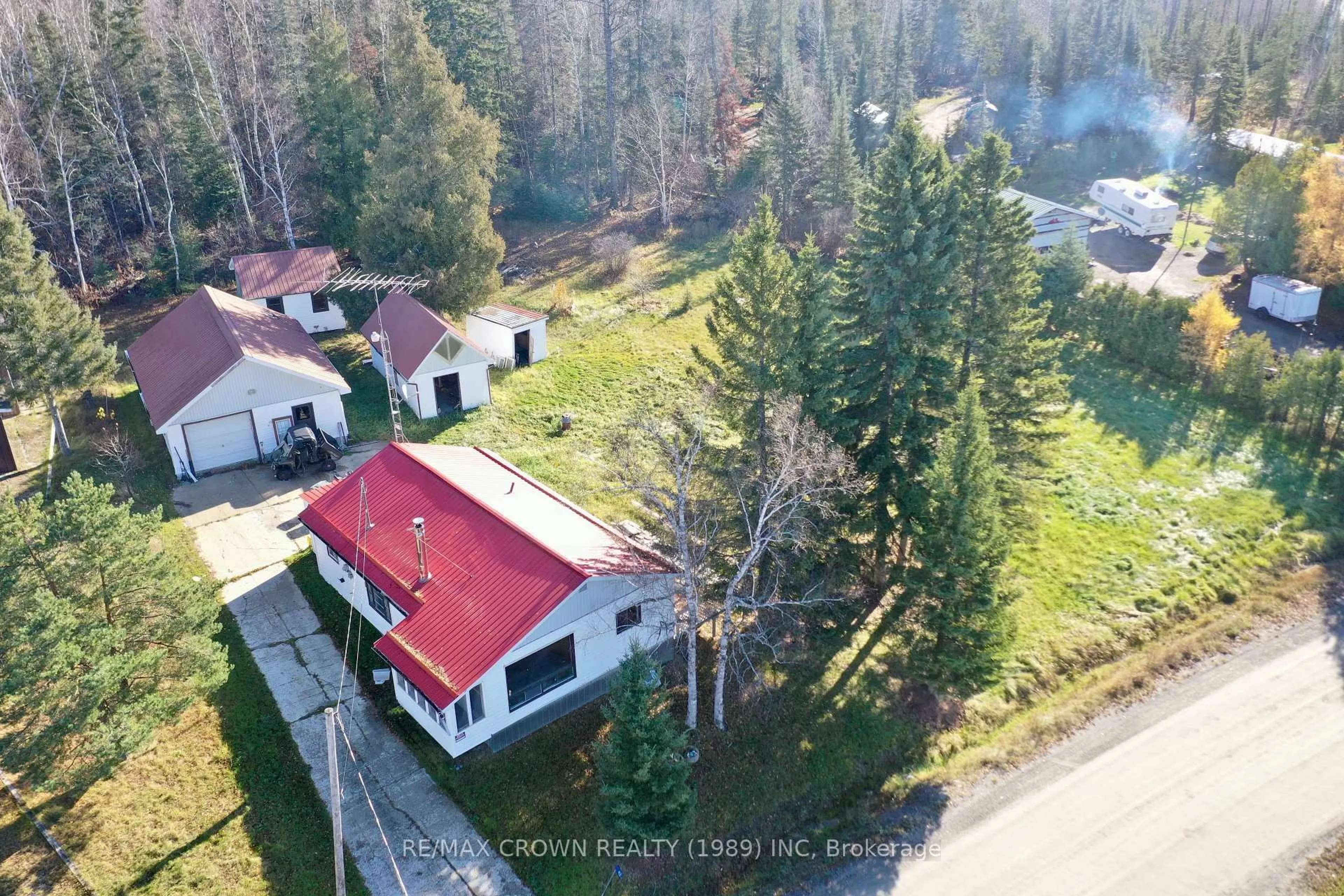 A pic from outside/outdoor area/front of a property/back of a property/a pic from drone, unknown for 42 Lefebvre Peninsula Rd, Kapuskasing Ontario P0L 1V0