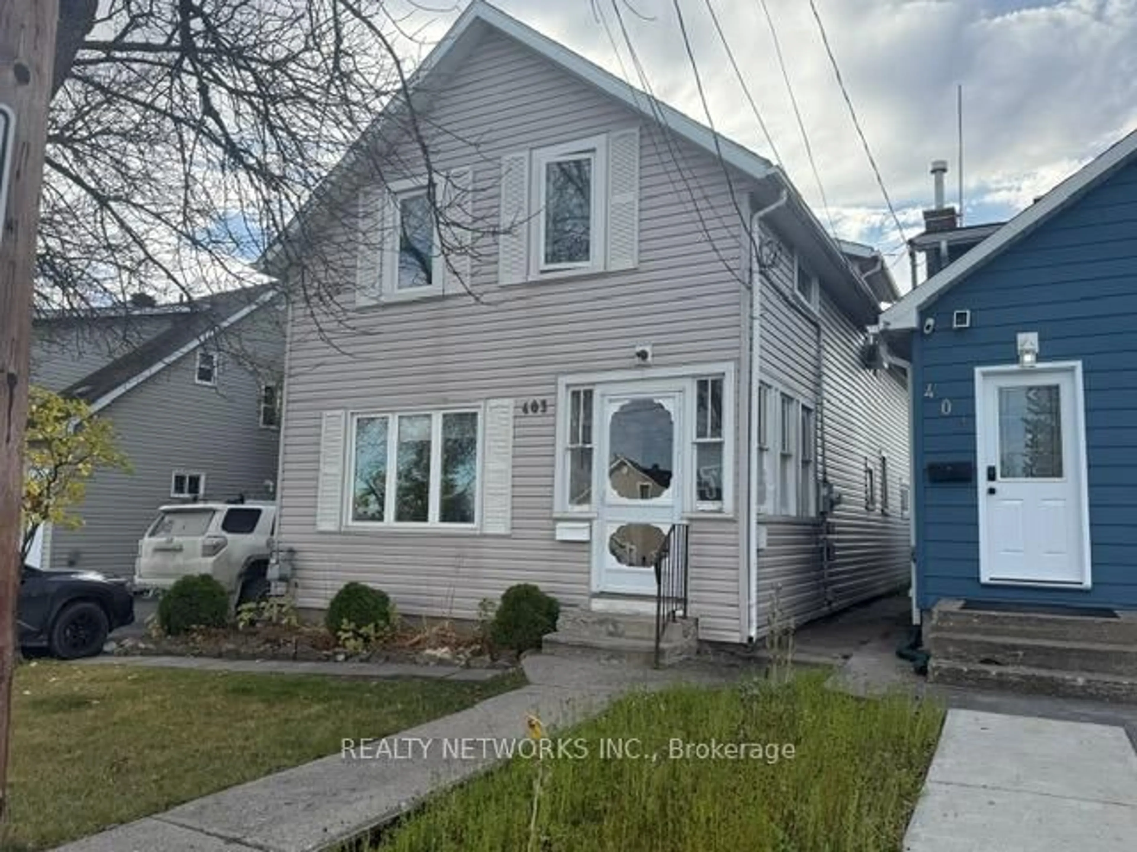 Home with vinyl exterior material, street for 403 James Ave, Timmins Ontario P4N 5T1