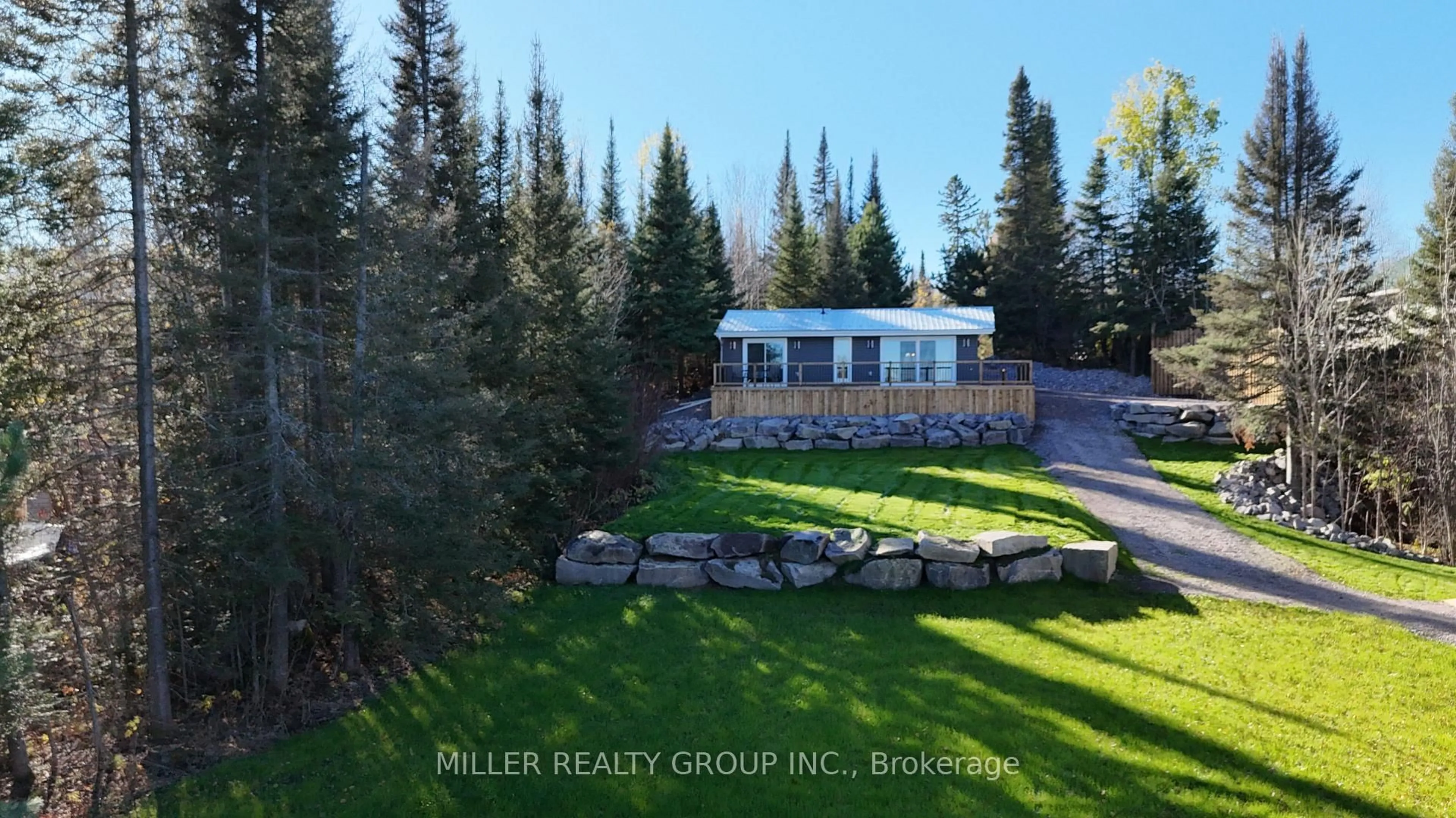 A pic from outside/outdoor area/front of a property/back of a property/a pic from drone, water/lake/river/ocean view for 93 Ontario St, Timiskaming Ontario P0J 1G0