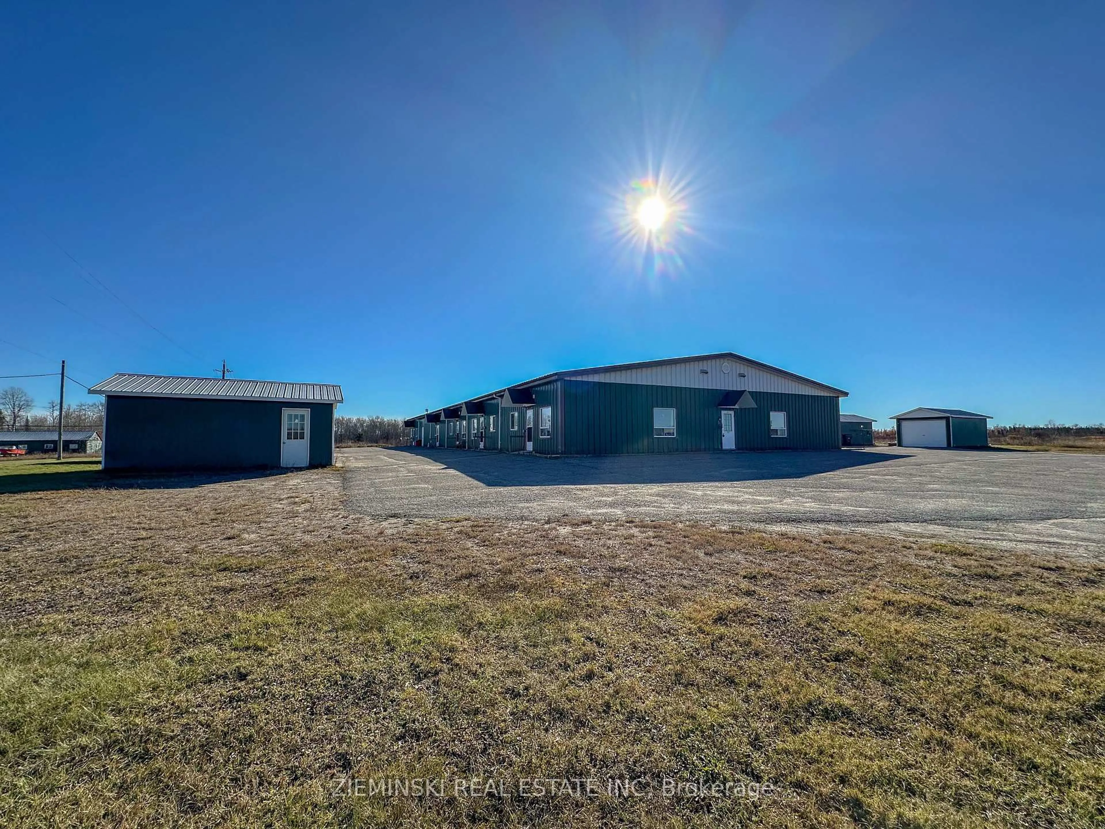A pic from outside/outdoor area/front of a property/back of a property/a pic from drone, building for 727 Ambridge Dr, Iroquois Falls Ontario P0K 1G0