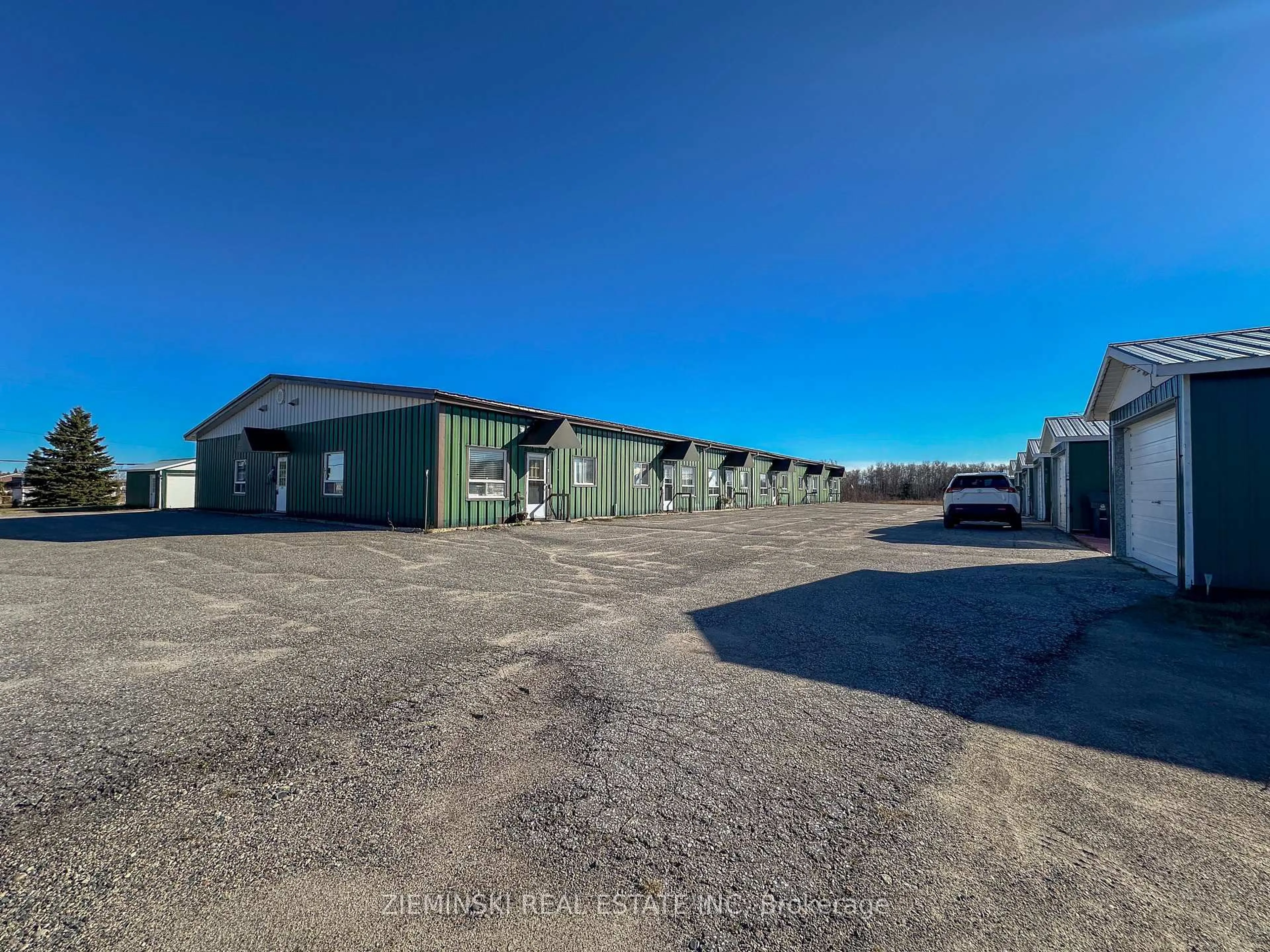 A pic from outside/outdoor area/front of a property/back of a property/a pic from drone, building for 727 Ambridge Dr, Iroquois Falls Ontario P0K 1G0