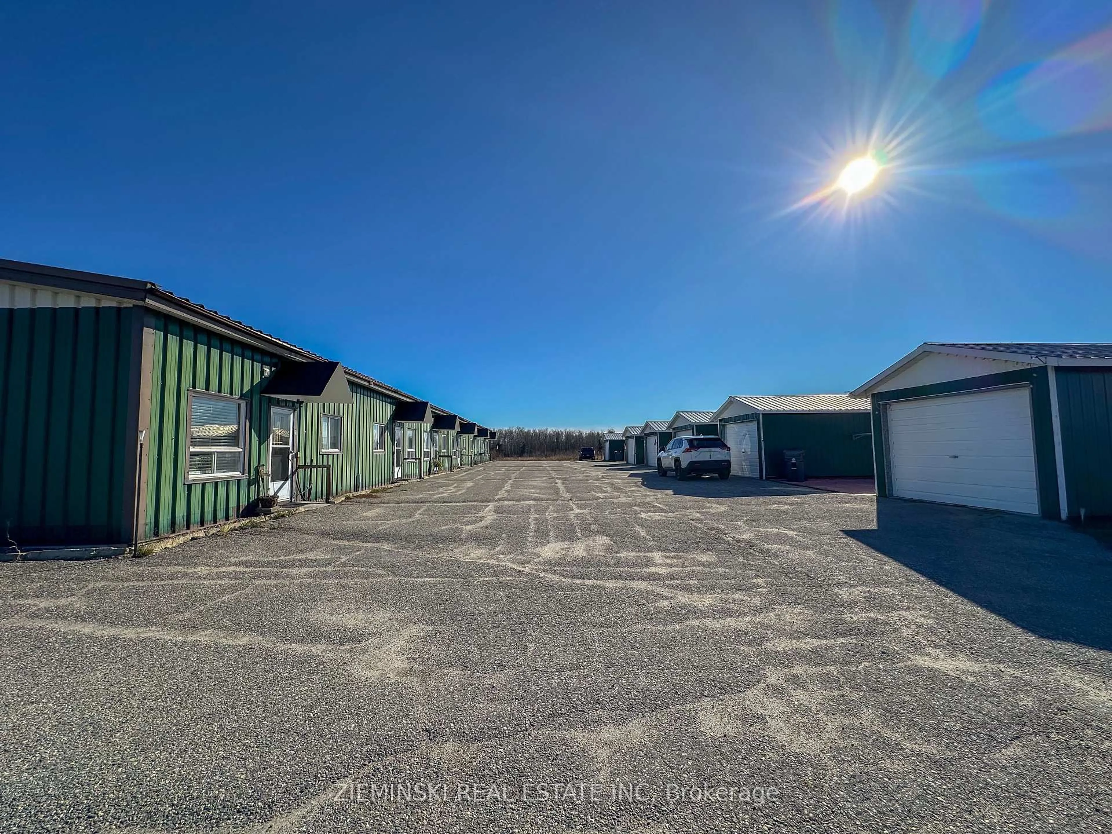 A pic from outside/outdoor area/front of a property/back of a property/a pic from drone, street for 727 Ambridge Dr, Iroquois Falls Ontario P0K 1G0