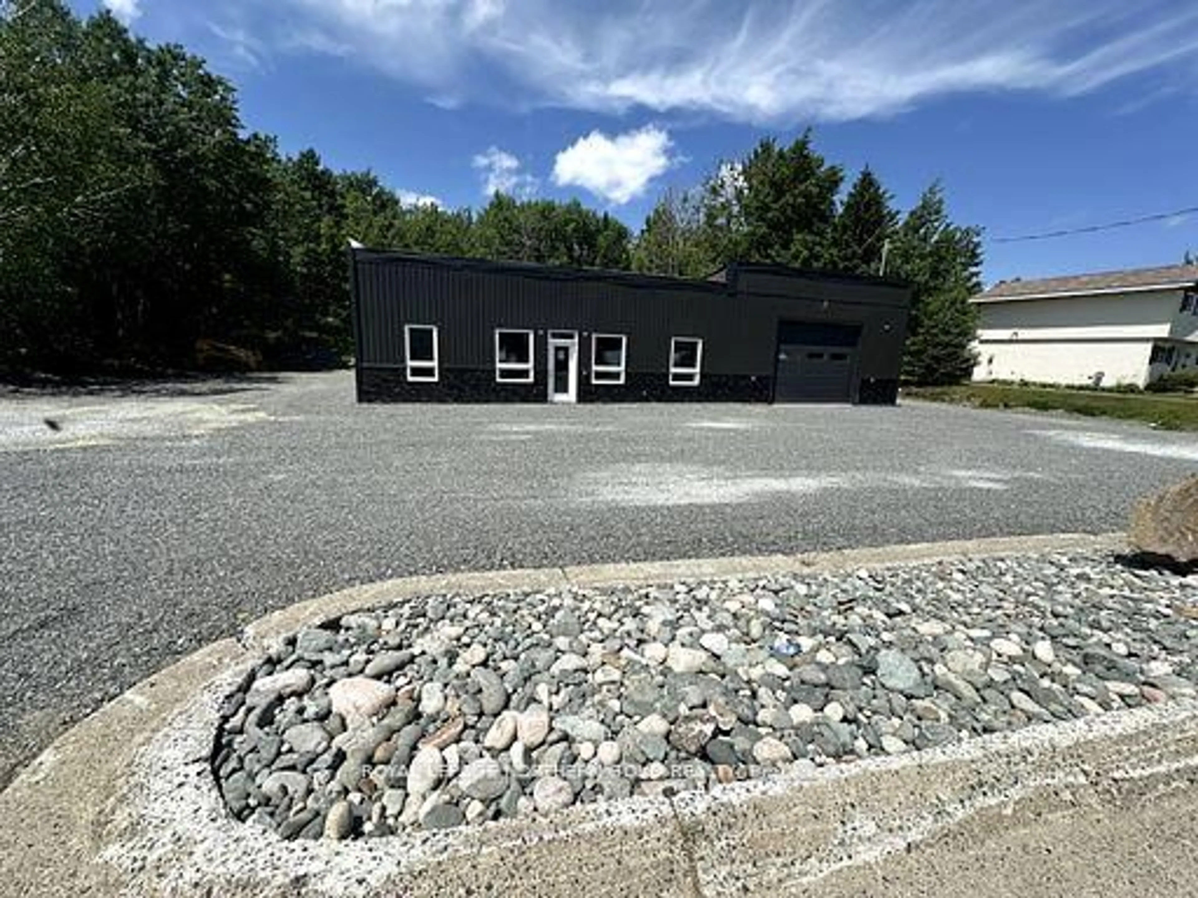 A pic from outside/outdoor area/front of a property/back of a property/a pic from drone, building for 728 Government Rd, Kirkland Lake Ontario P0K 1A0