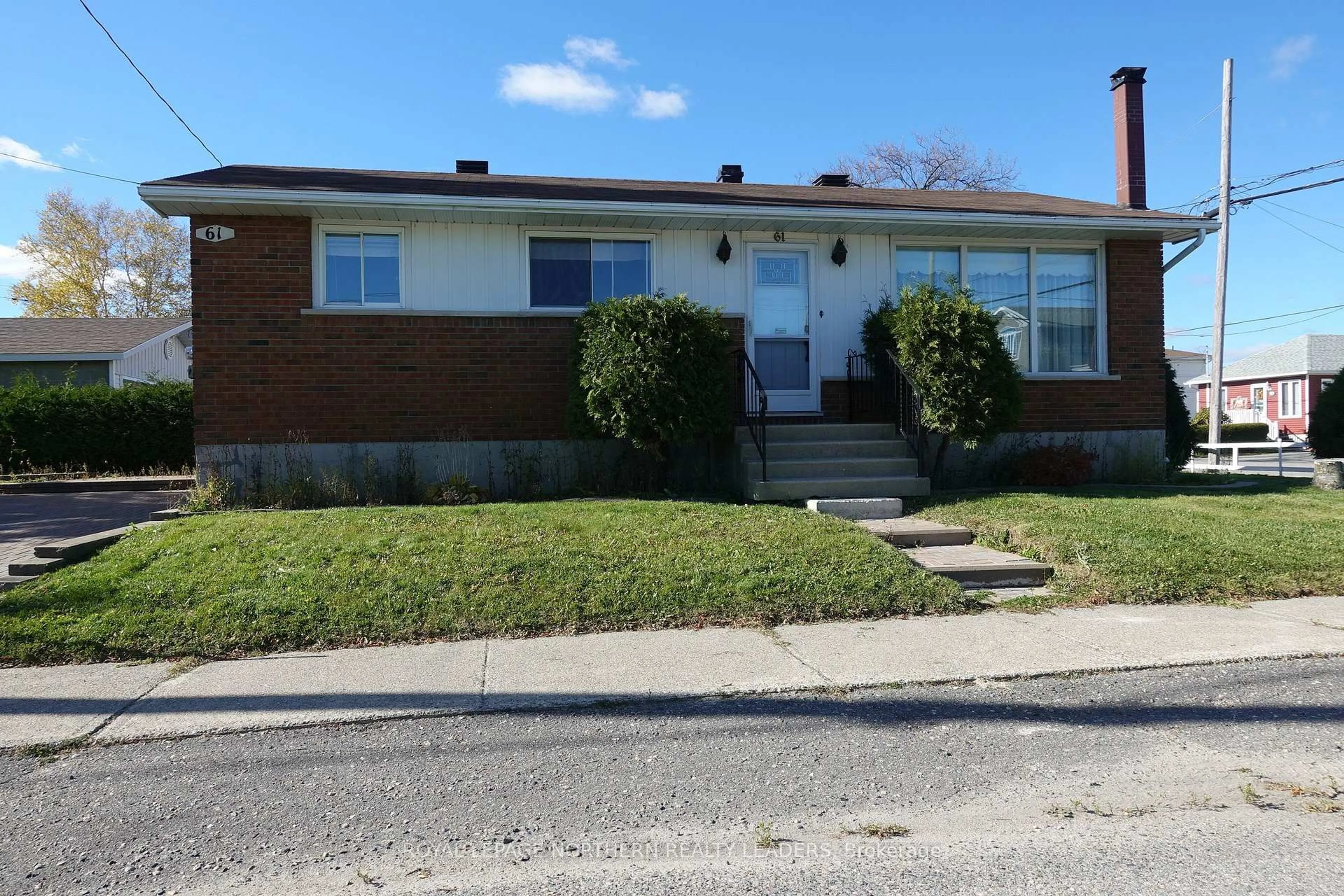 Home with brick exterior material, street for 61 Fogg St, Timmins Ontario P4N 5E6