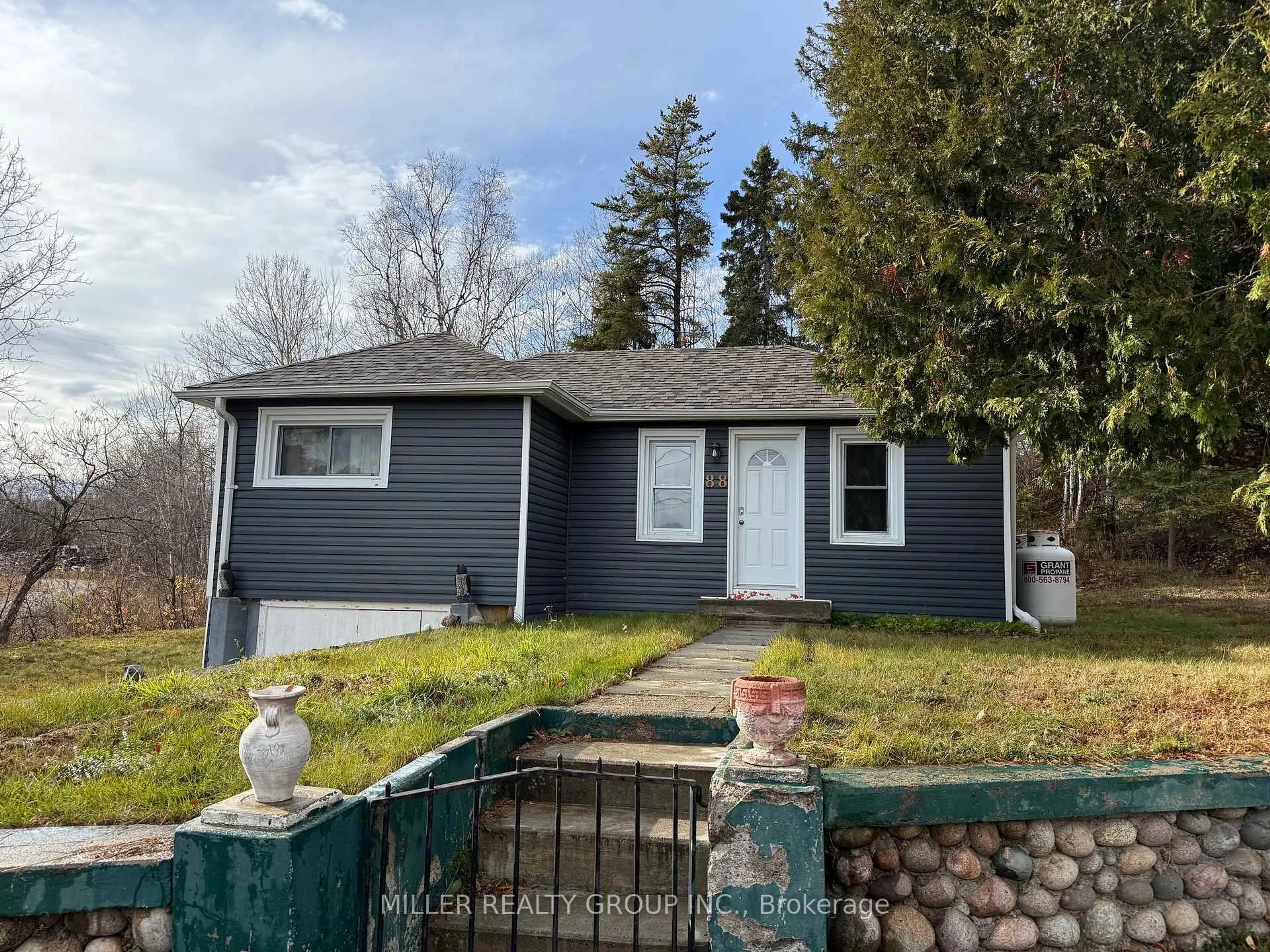 Home with vinyl exterior material, street for 88 Cobalt St, Cobalt Ontario P0J 1C0