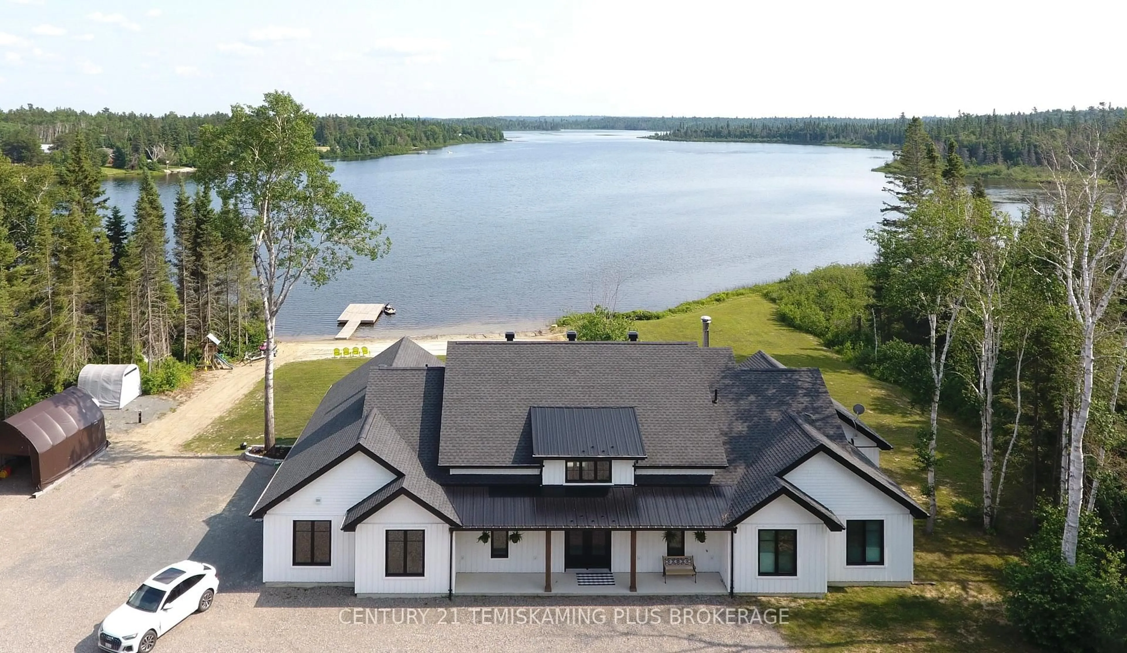 A pic from outside/outdoor area/front of a property/back of a property/a pic from drone, water/lake/river/ocean view for 8178 Pike Lake Rd, Hudson Ontario P0J 1P0