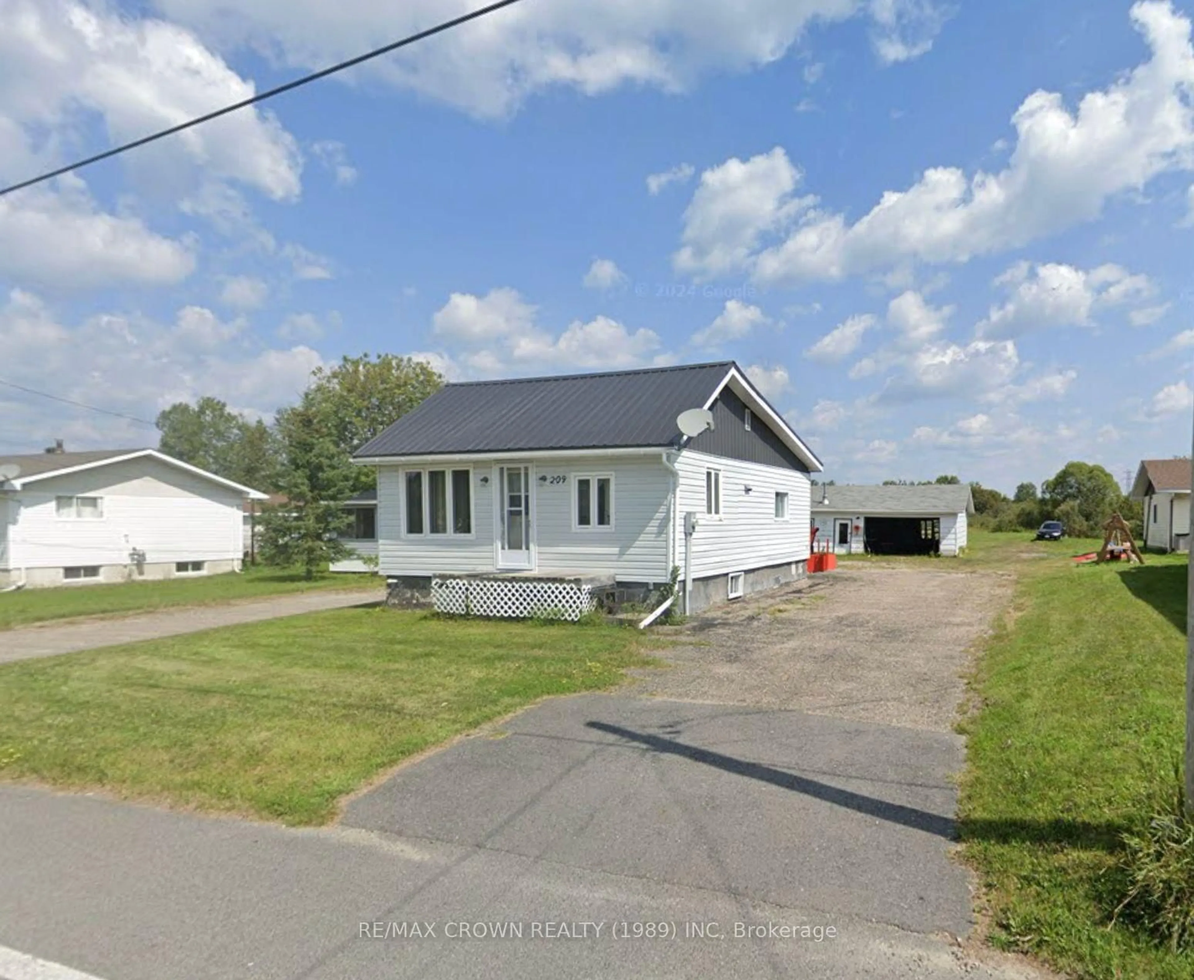 A pic from outside/outdoor area/front of a property/back of a property/a pic from drone, street for 209 Ross Rd, Smooth Rock Falls Ontario P0L 2B0