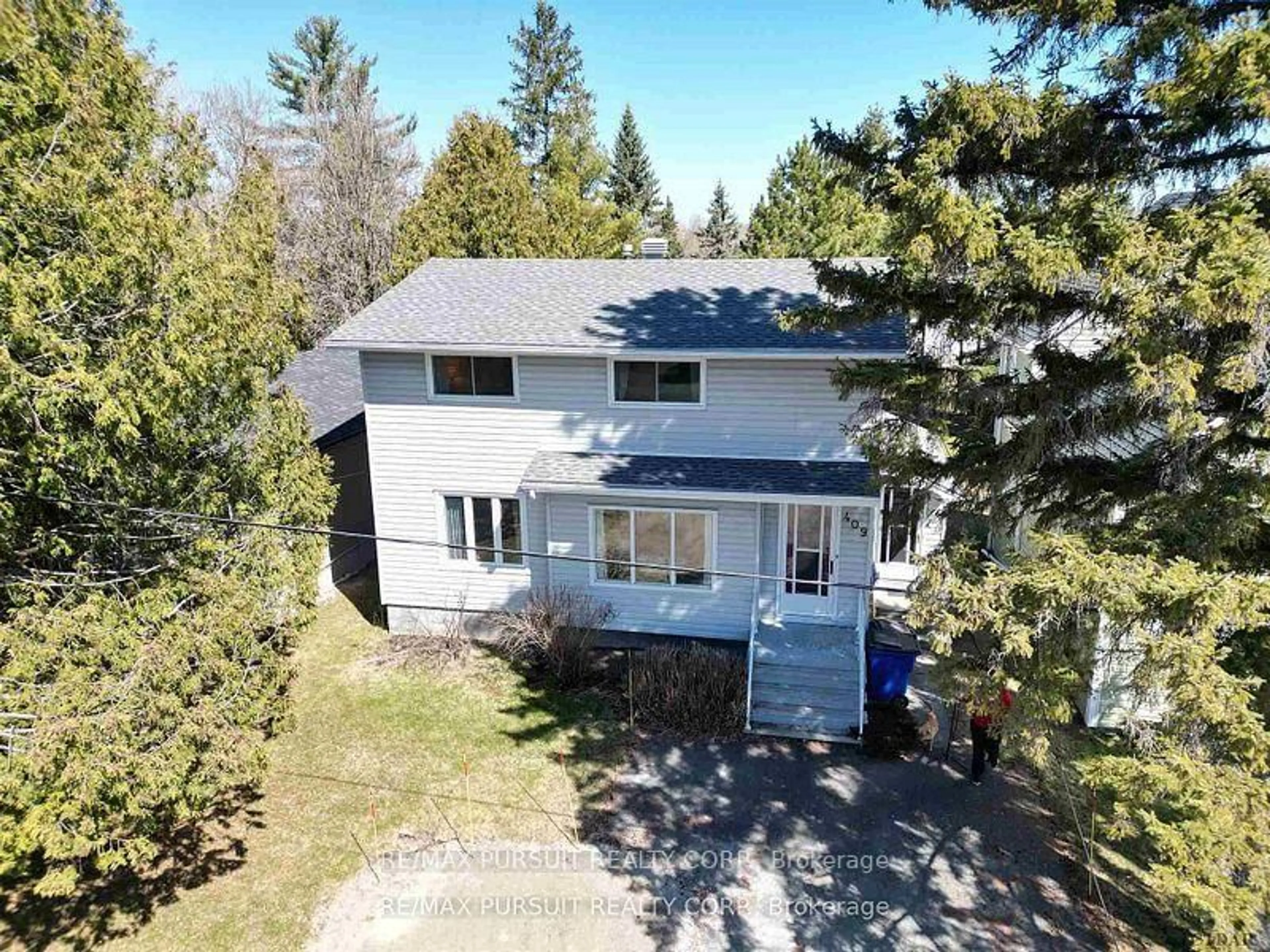 A pic from outside/outdoor area/front of a property/back of a property/a pic from drone, street for 409 Mccamus Ave, Temiskaming Shores Ontario P0J 1P0