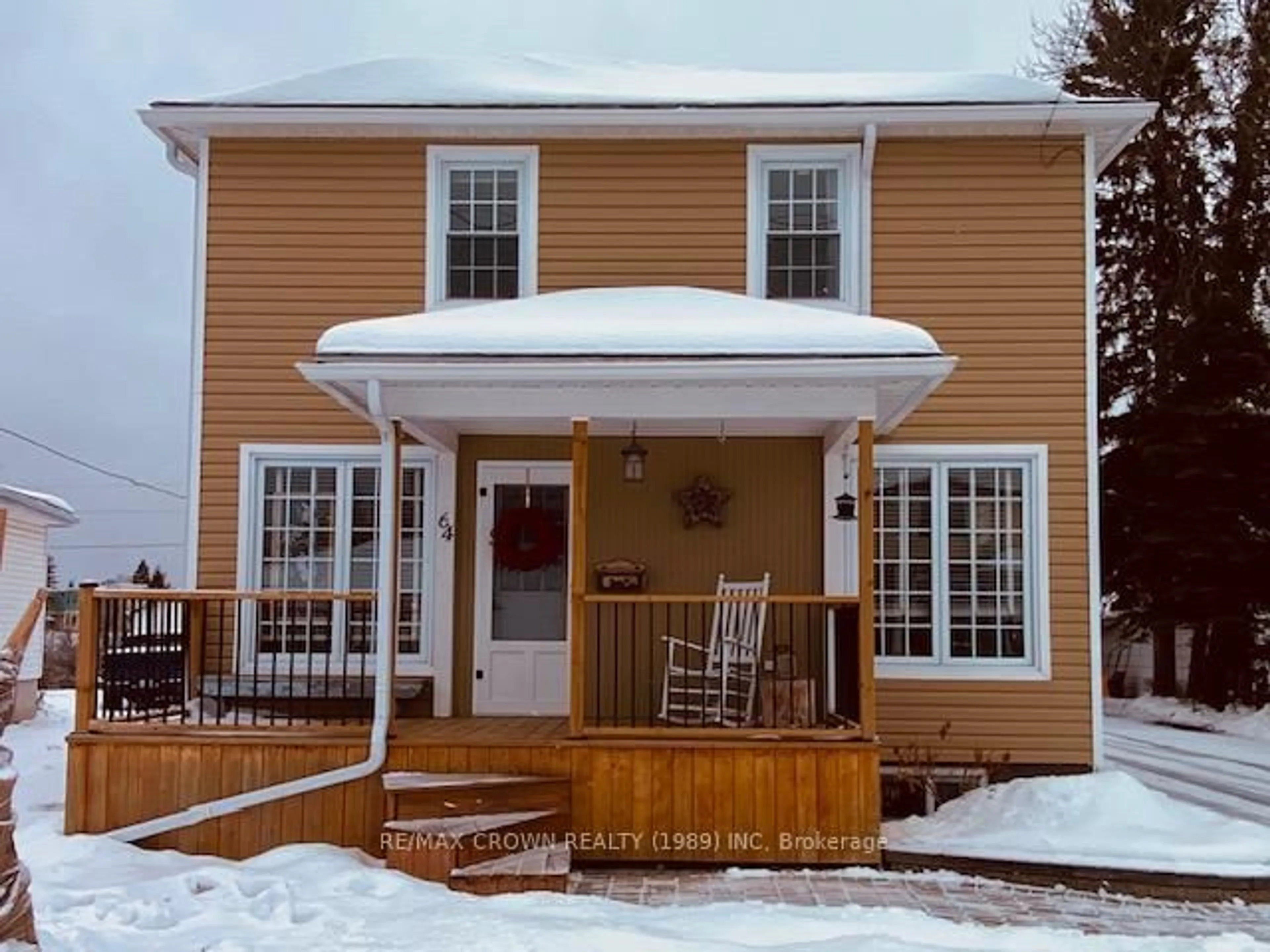 Home with vinyl exterior material, street for 64 Byng Ave, Kapuskasing Ontario P5N 1W8