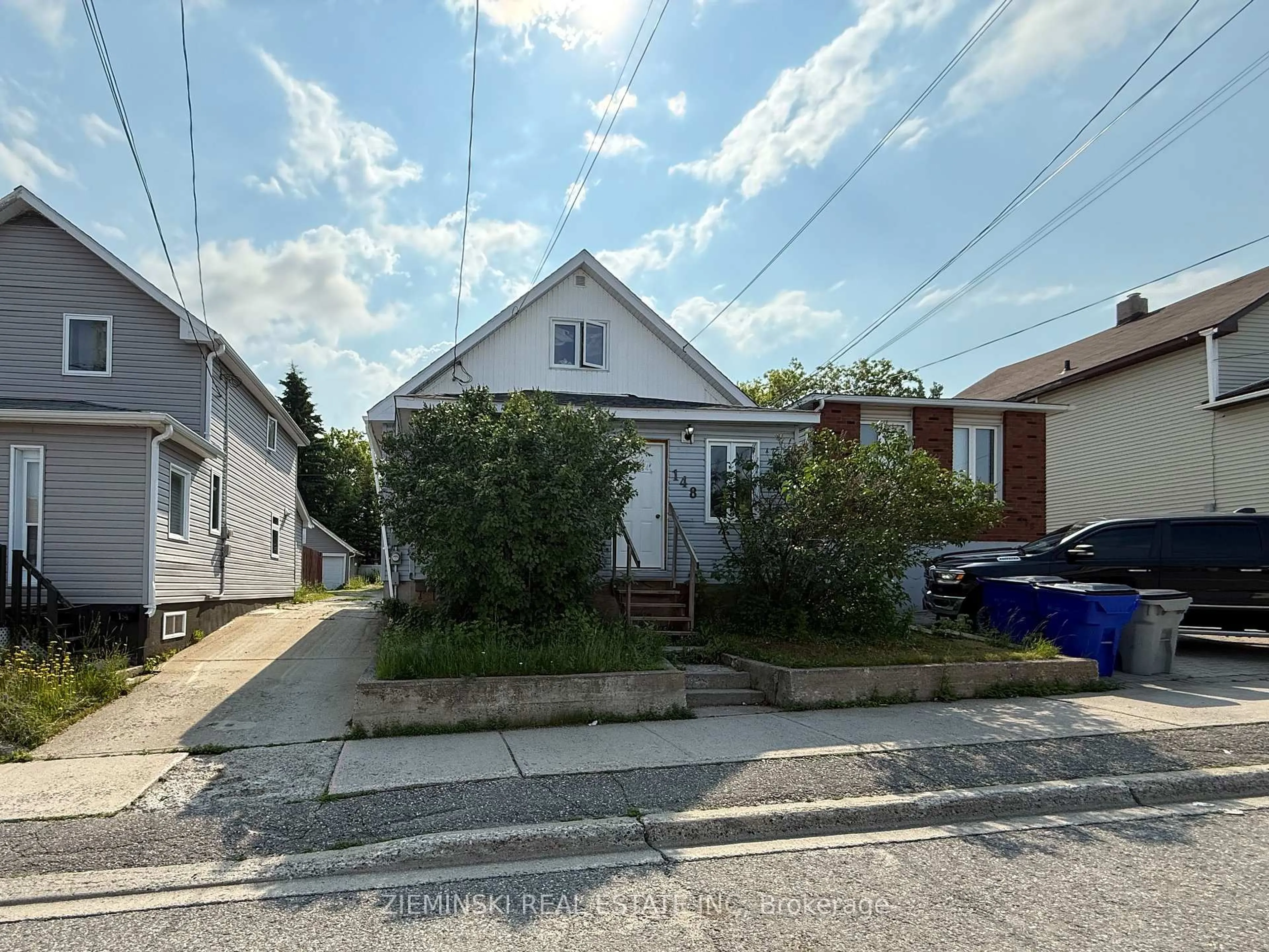 A pic from outside/outdoor area/front of a property/back of a property/a pic from drone, street for 148 Pine St, Timmins Ontario P4N 6L1