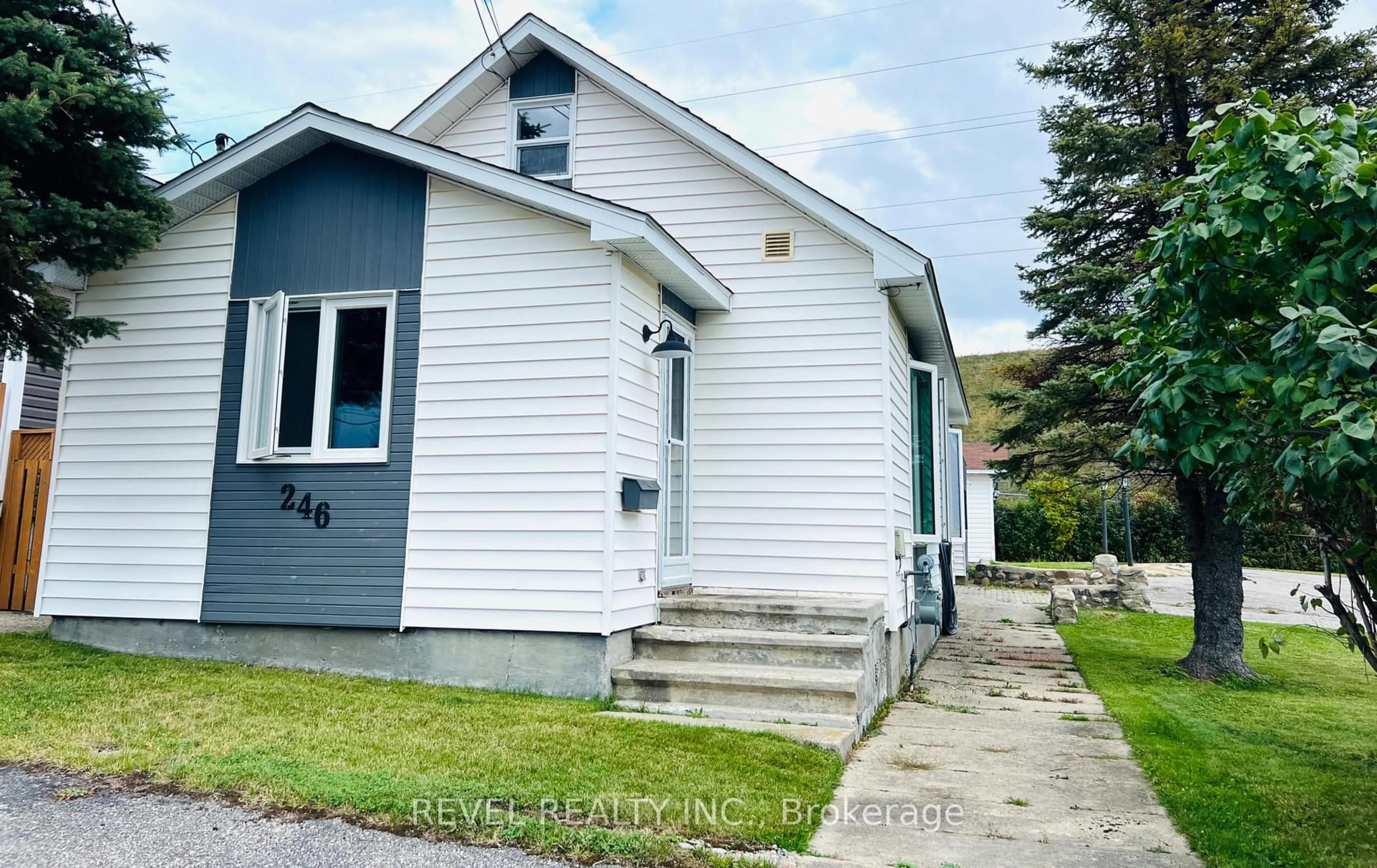 Home with vinyl exterior material, street for 246 Laidlaw St, Timmins Ontario P4N 2P8