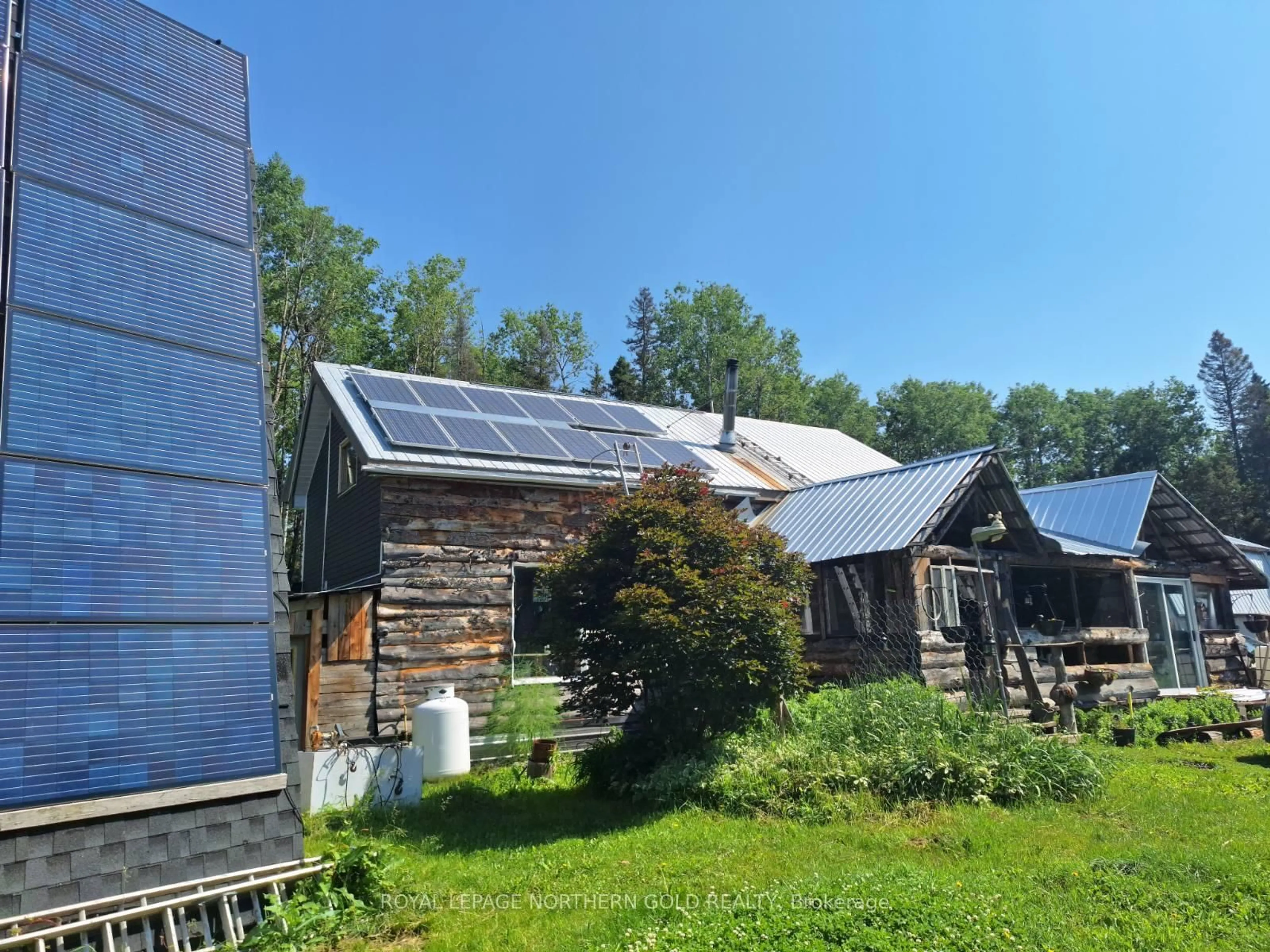A pic from outside/outdoor area/front of a property/back of a property/a pic from drone, building for 1 Davey Lowe Rd, Kirkland Lake Ontario P0K 1L0