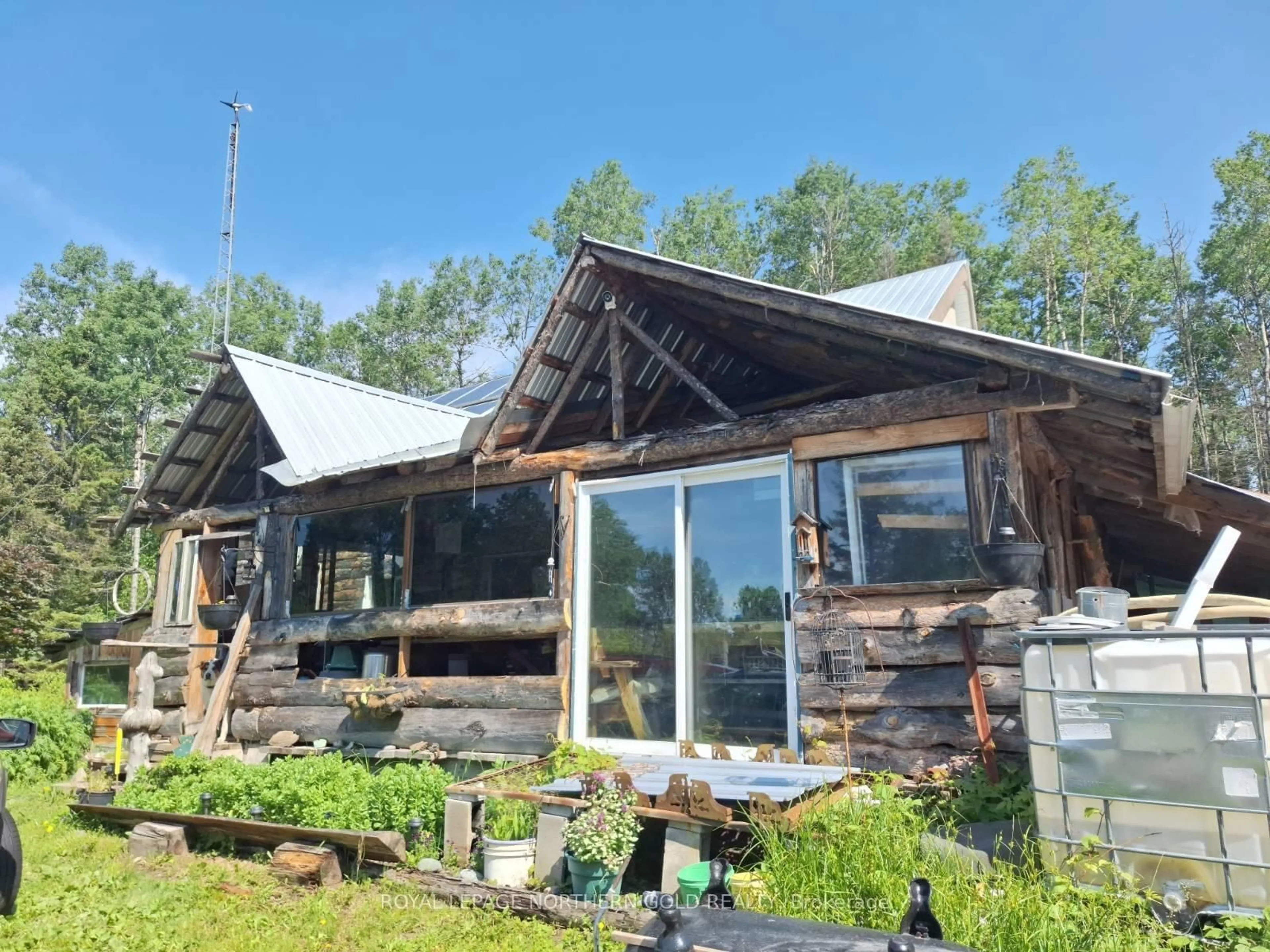 A pic from outside/outdoor area/front of a property/back of a property/a pic from drone, unknown for 1 Davey Lowe Rd, Kirkland Lake Ontario P0K 1L0