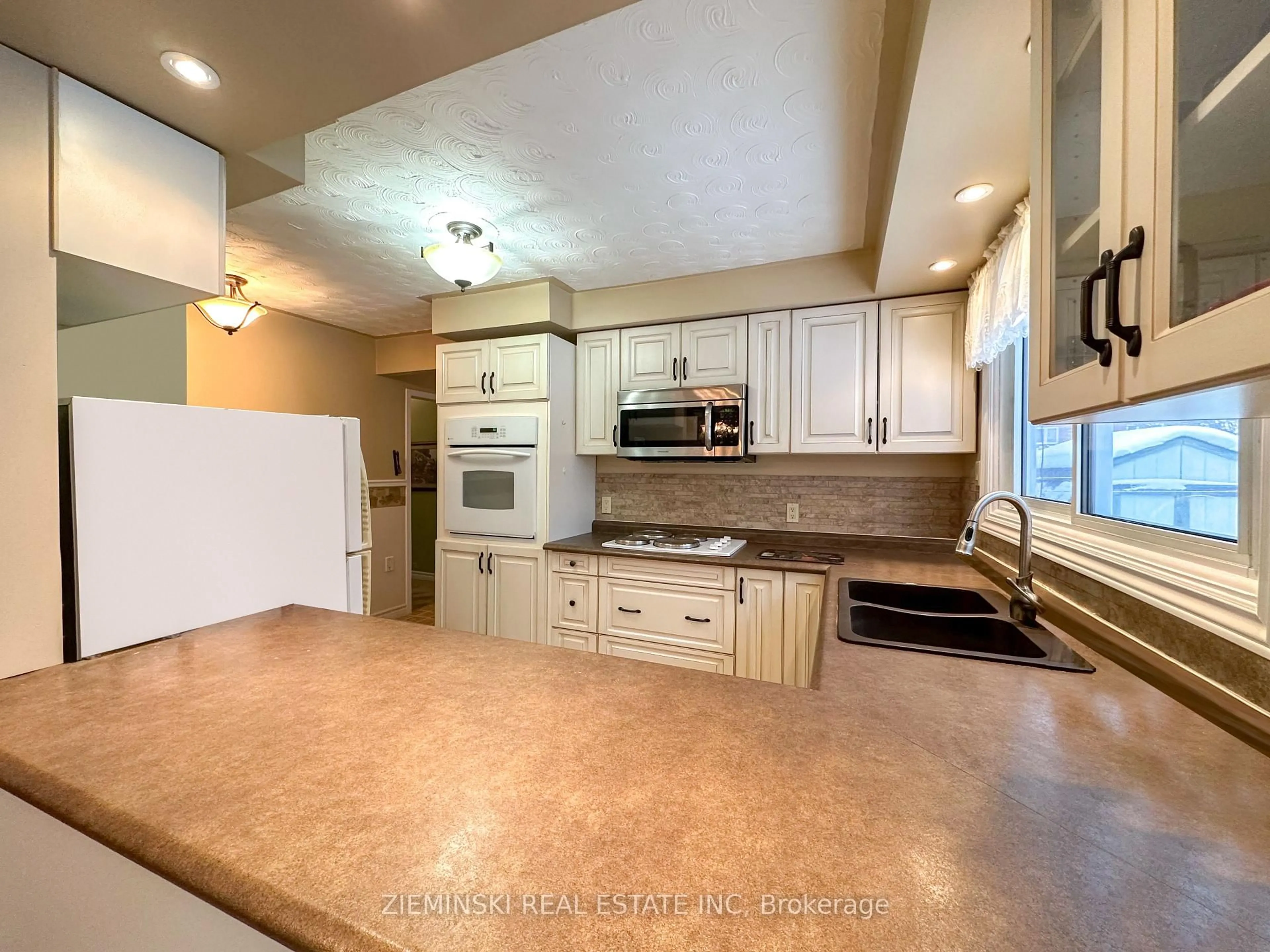 Open concept kitchen, ceramic/tile floor for 229 Fyfe Ave, Iroquois Falls Ontario P0K 1E0