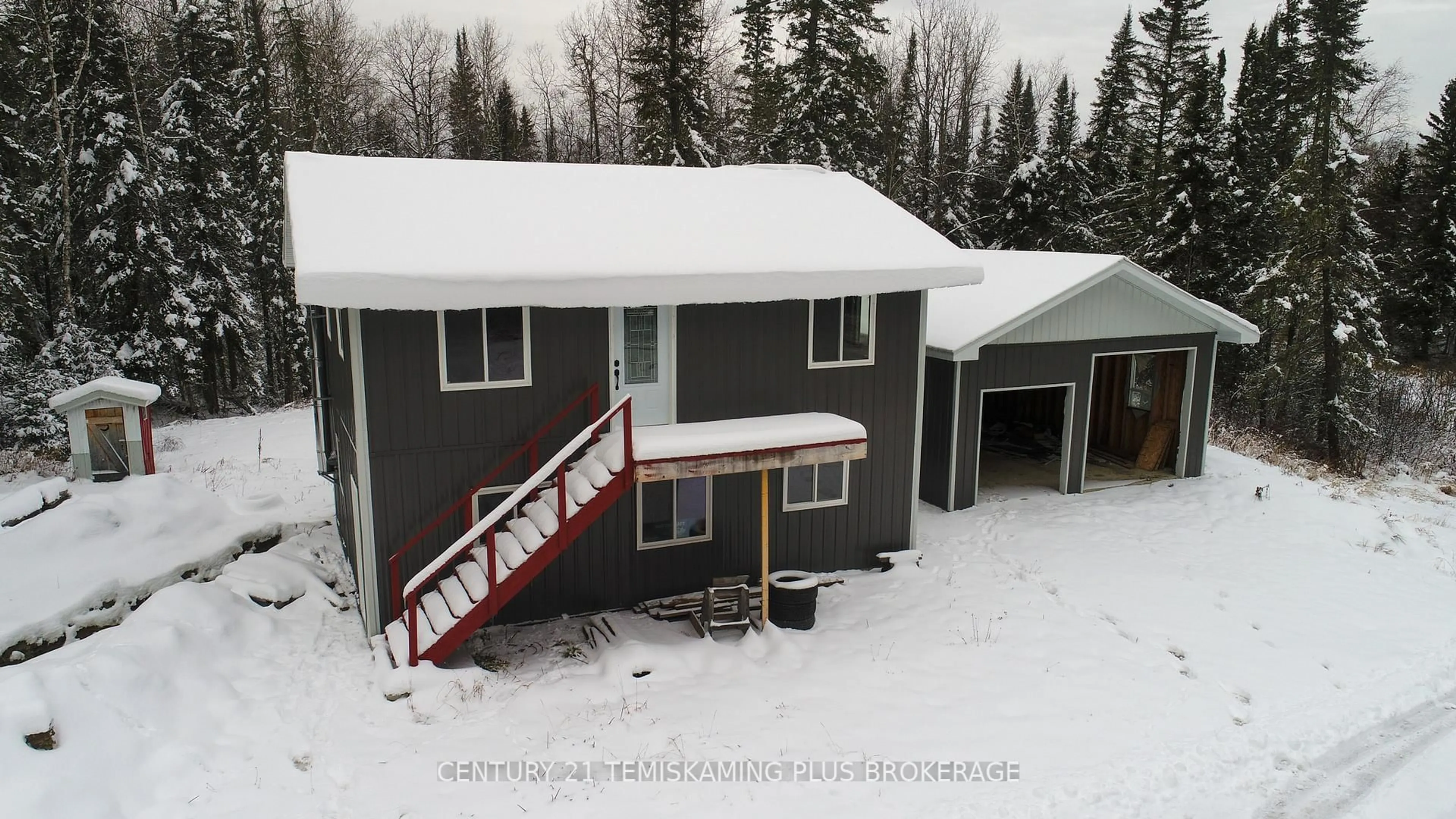 A pic from outside/outdoor area/front of a property/back of a property/a pic from drone, building for 5122 112 Highway, Kirkland Lake Ontario P0K 1T0