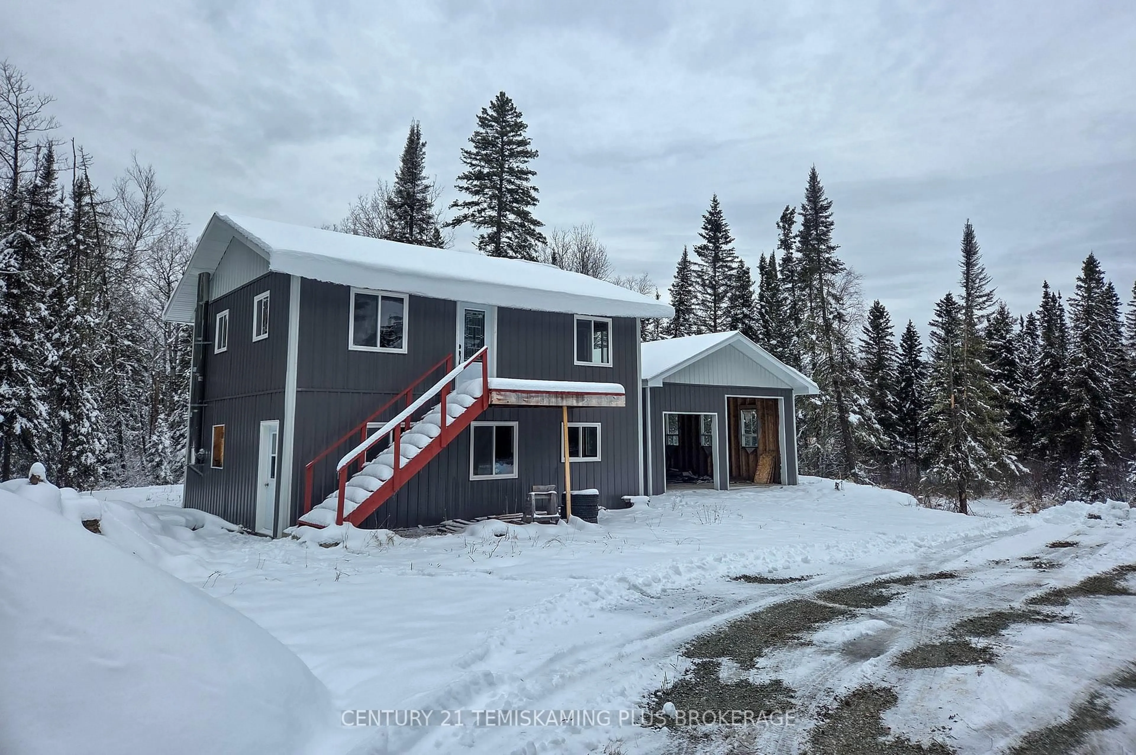 A pic from outside/outdoor area/front of a property/back of a property/a pic from drone, unknown for 5122 112 Highway, Kirkland Lake Ontario P0K 1T0