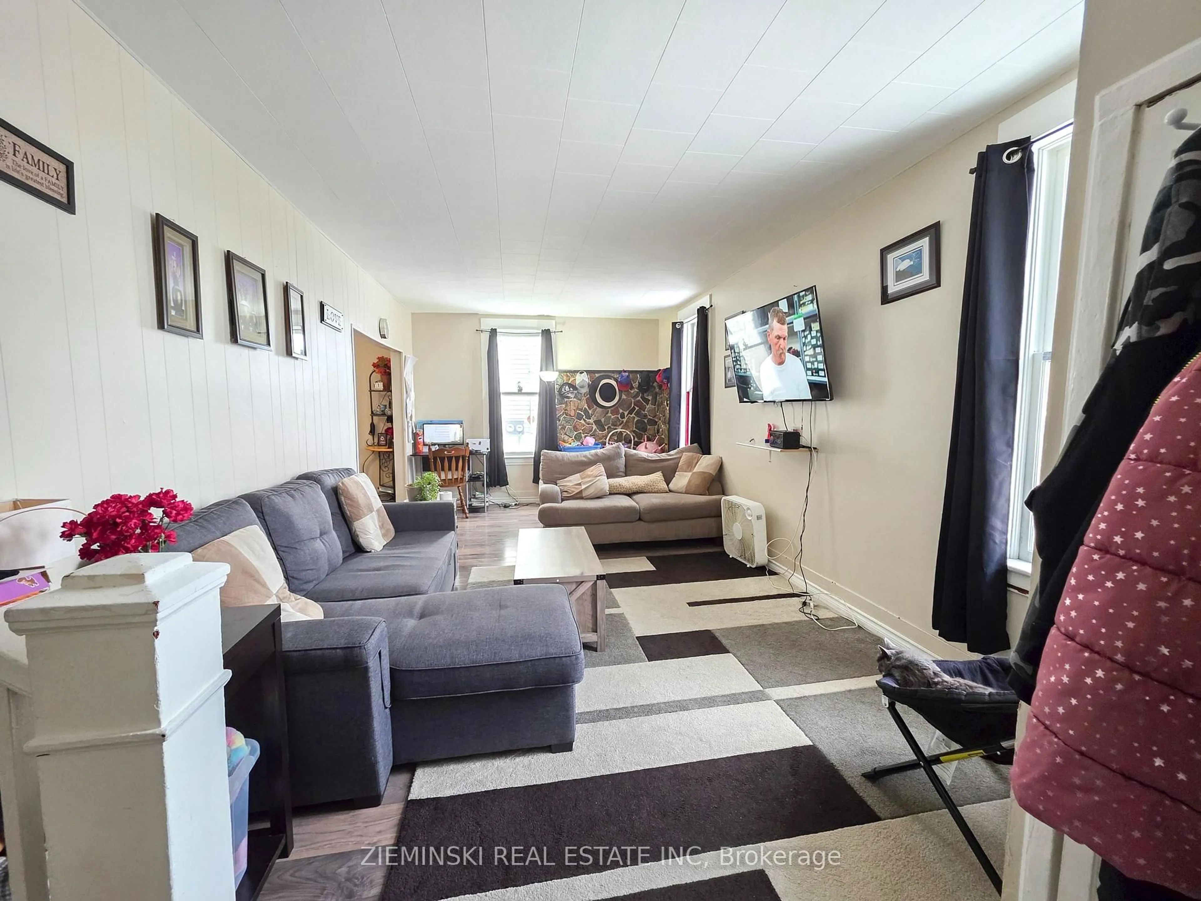 Living room with furniture, unknown for 65 Kirby Ave, Timmins Ontario P4N 1J3