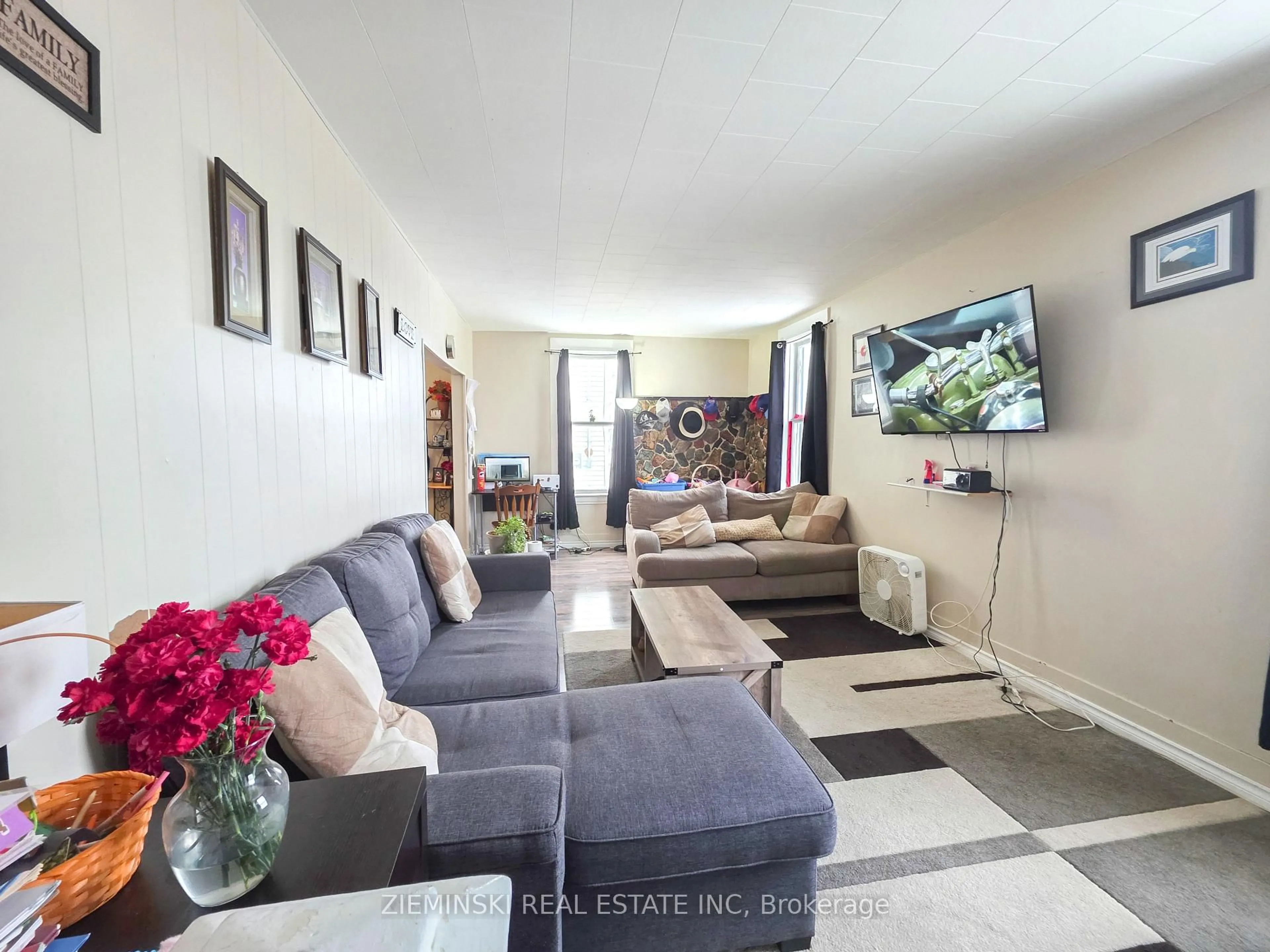 Living room with furniture, unknown for 65 Kirby Ave, Timmins Ontario P4N 1J3