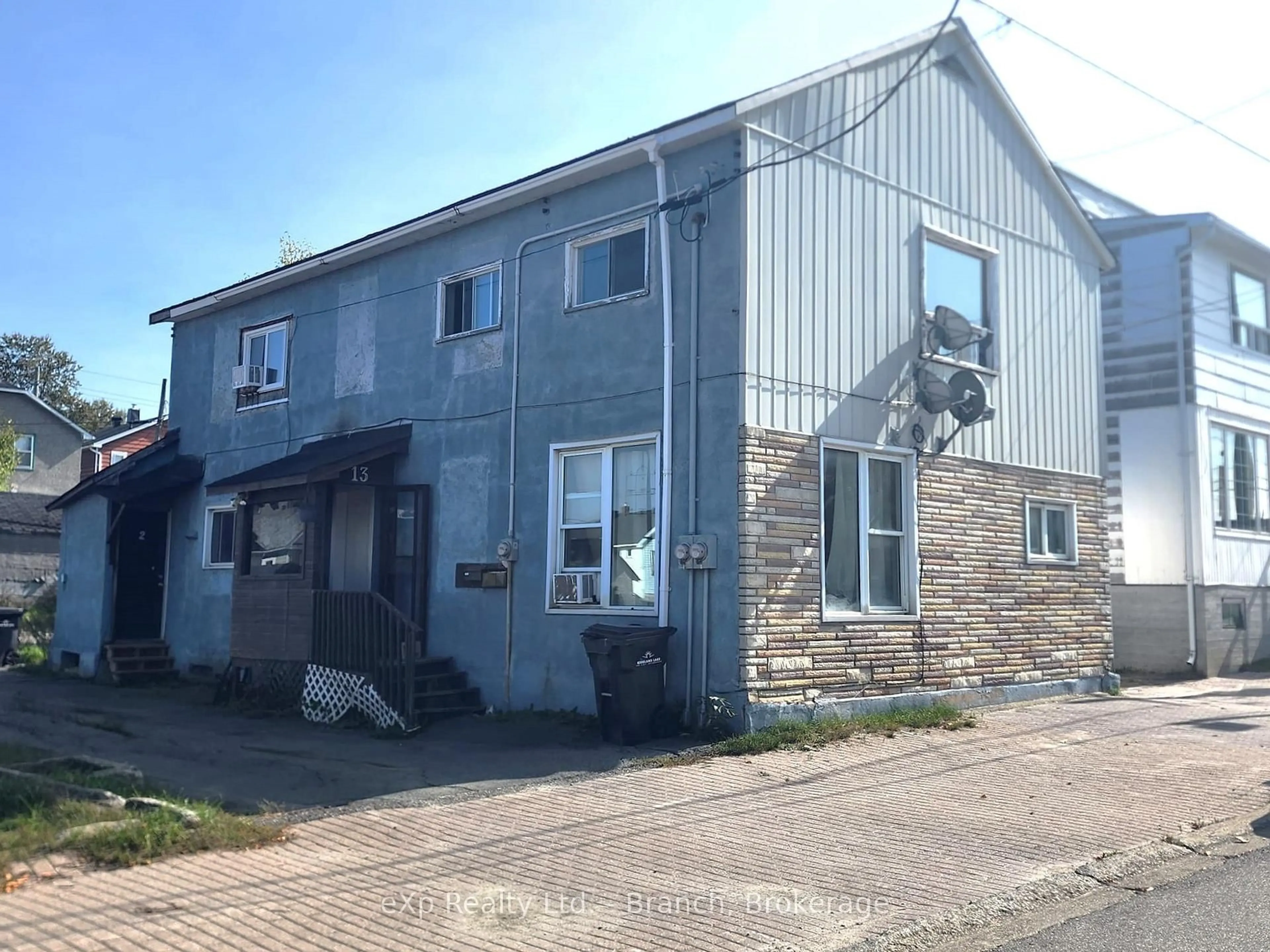 A pic from outside/outdoor area/front of a property/back of a property/a pic from drone, building for 13 Main St, Kirkland Lake Ontario P2N 3C8