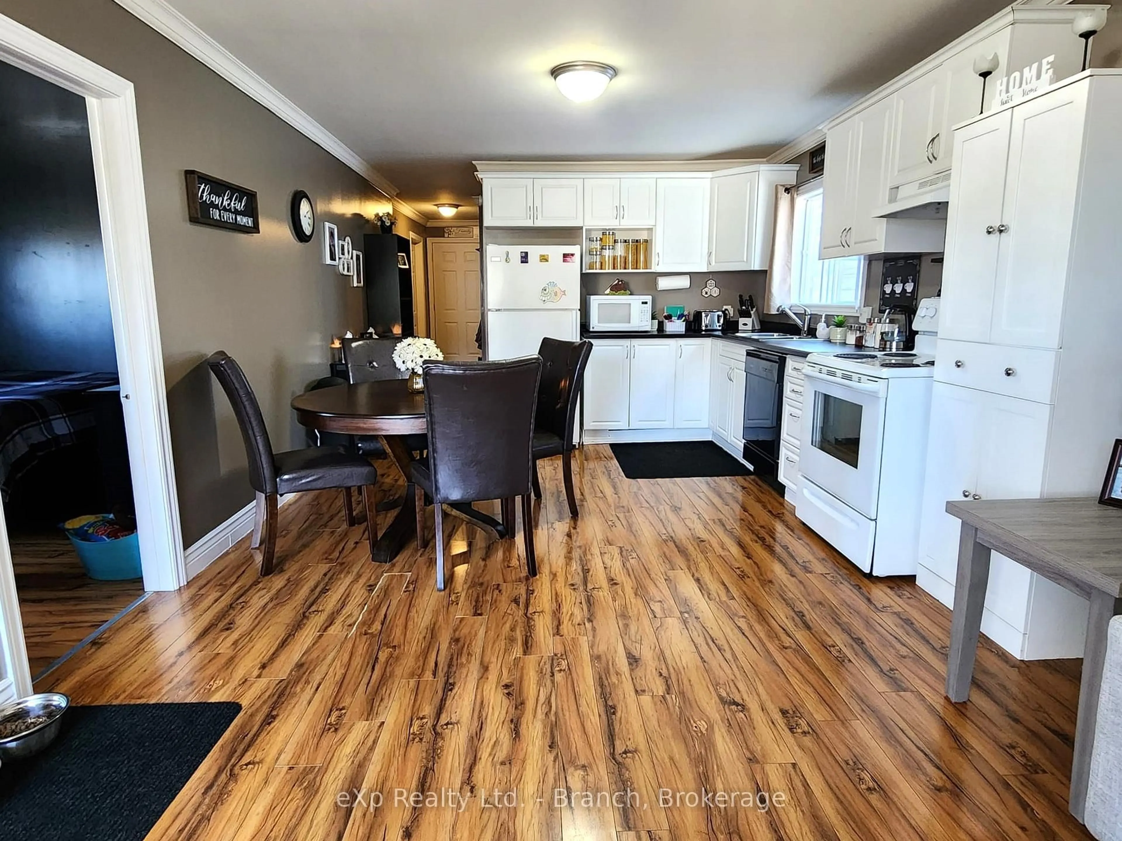 Open concept kitchen, wood/laminate floor for 13 Main St, Kirkland Lake Ontario P2N 3C8