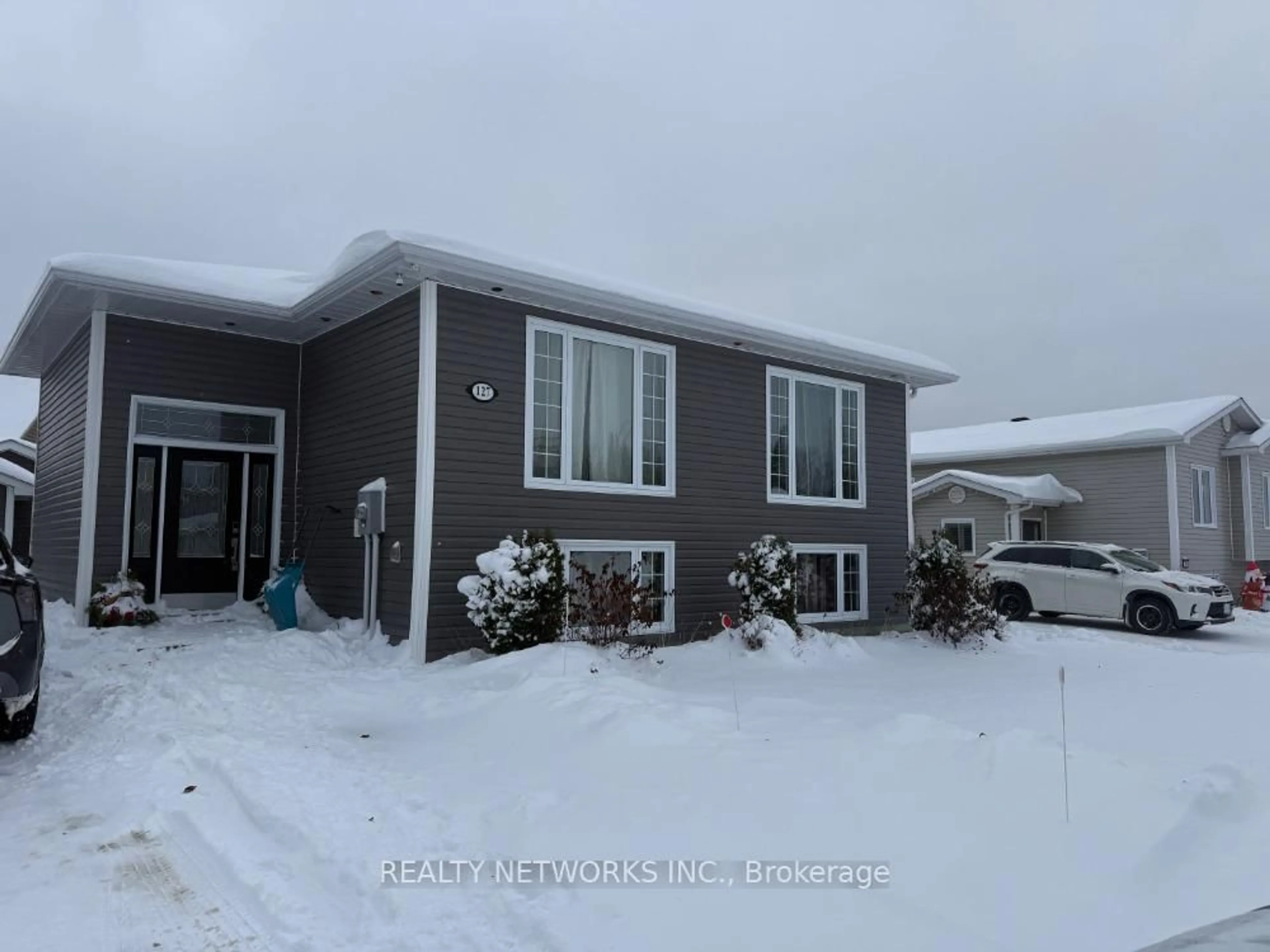 Home with vinyl exterior material, street for 127 Jv Bonhomme Blvd, Timmins Ontario P4P 1A2