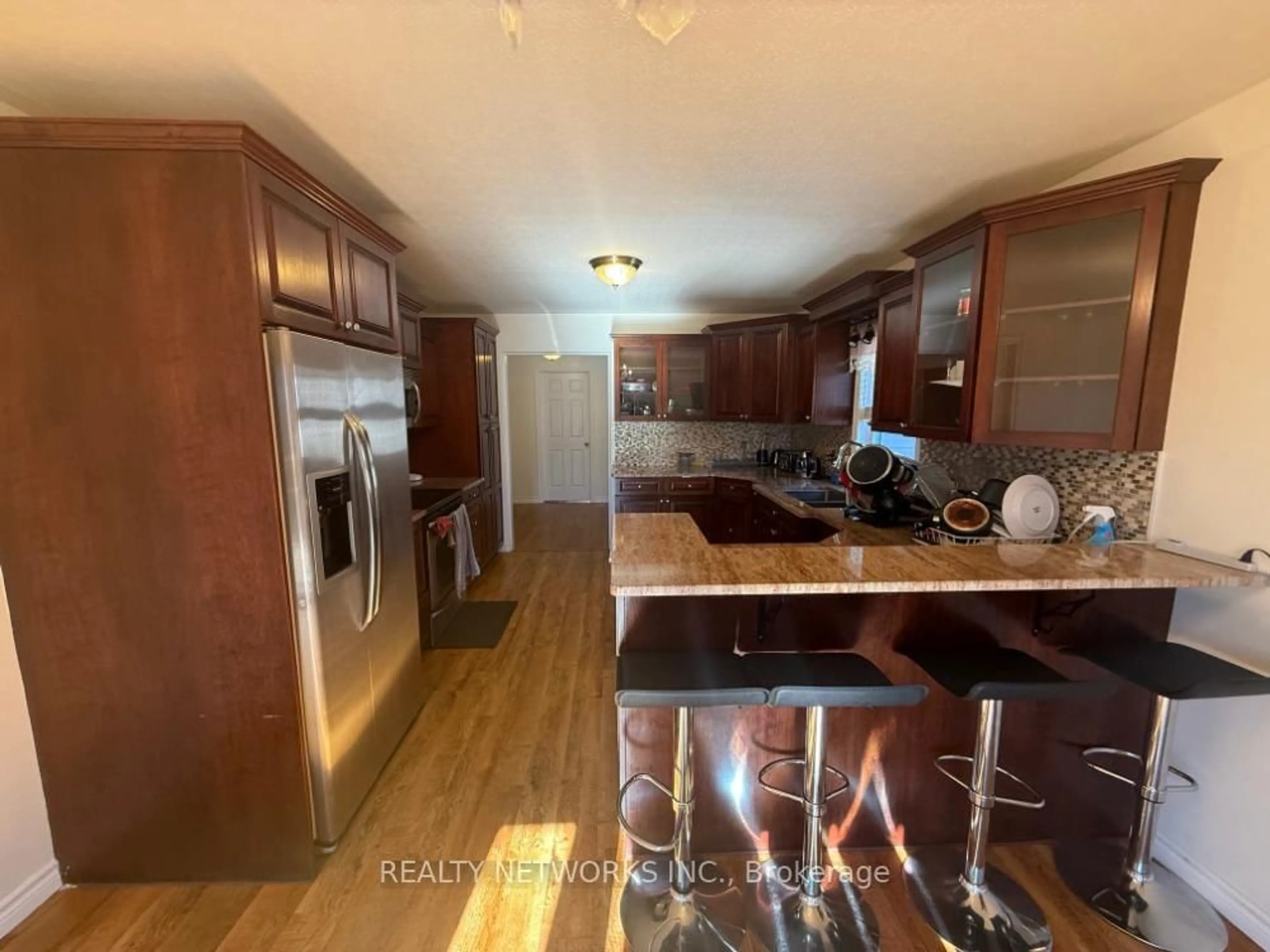 Open concept kitchen, wood/laminate floor for 127 Jv Bonhomme Blvd, Timmins Ontario P4P 1A2