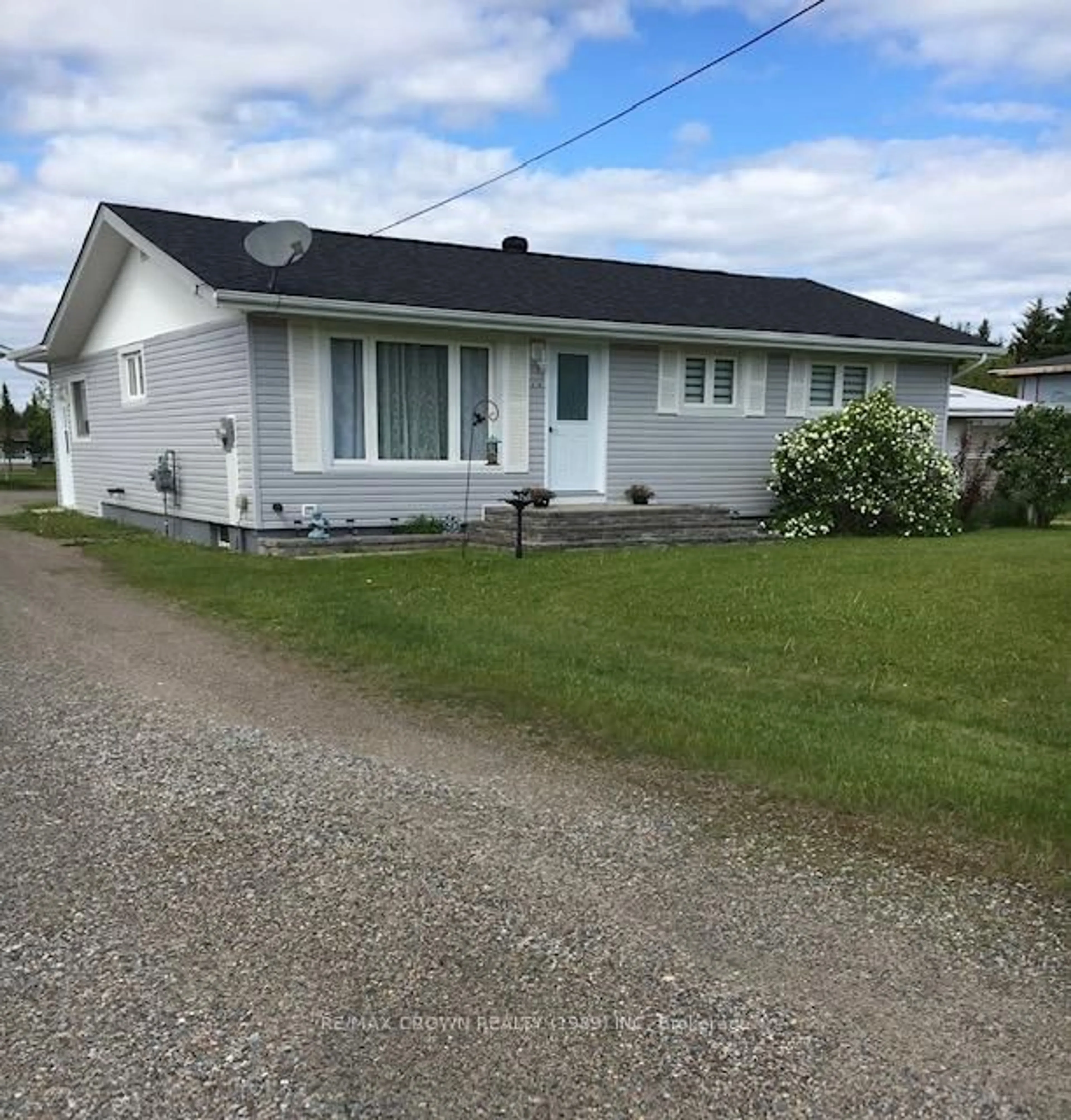 A pic from outside/outdoor area/front of a property/back of a property/a pic from drone, street for 316 Government Rd #HARTY, Kapuskasing Ontario P0L 1M0