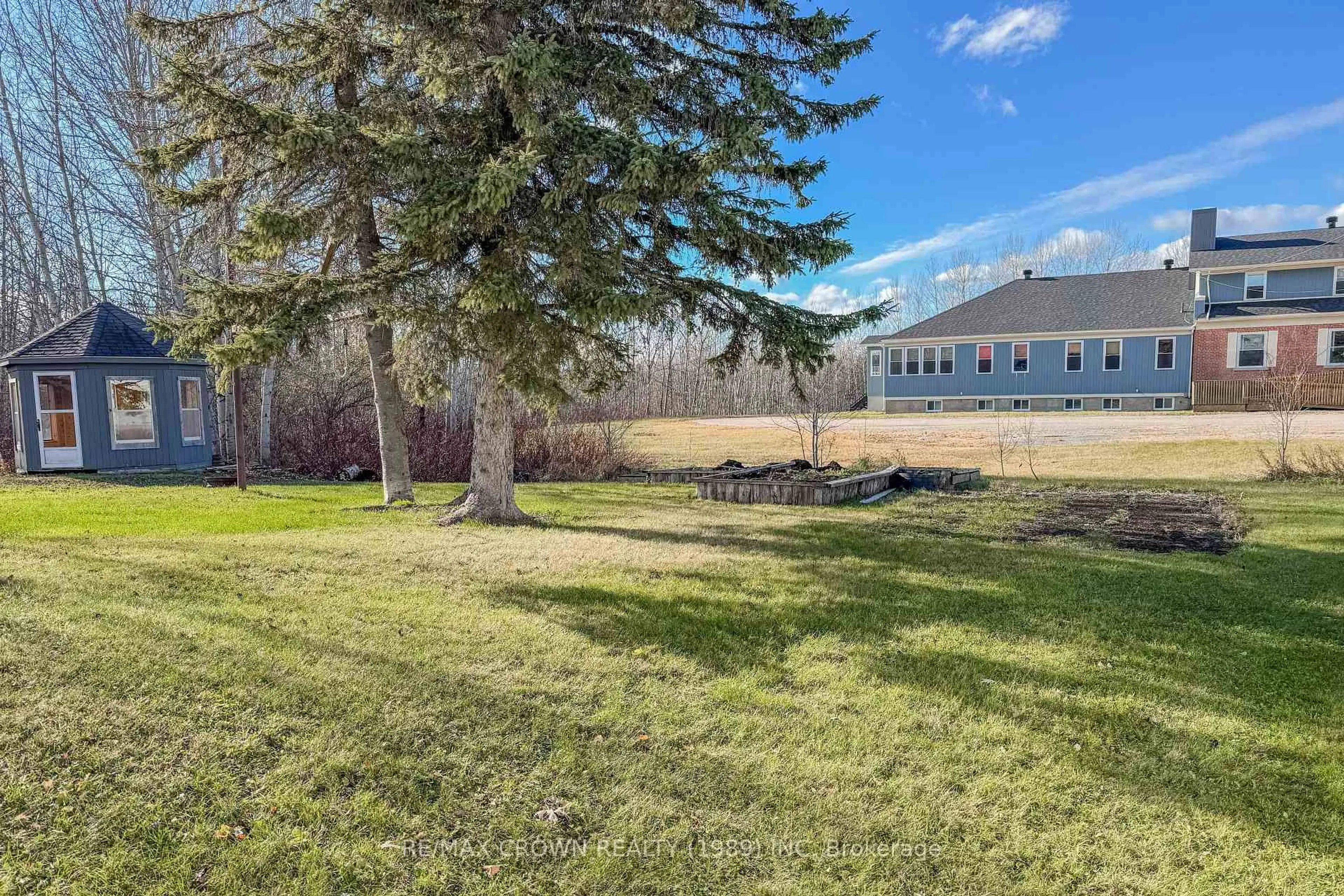 A pic from outside/outdoor area/front of a property/back of a property/a pic from drone, unknown for 102 First St, Smooth Rock Falls Ontario P0L 2B0