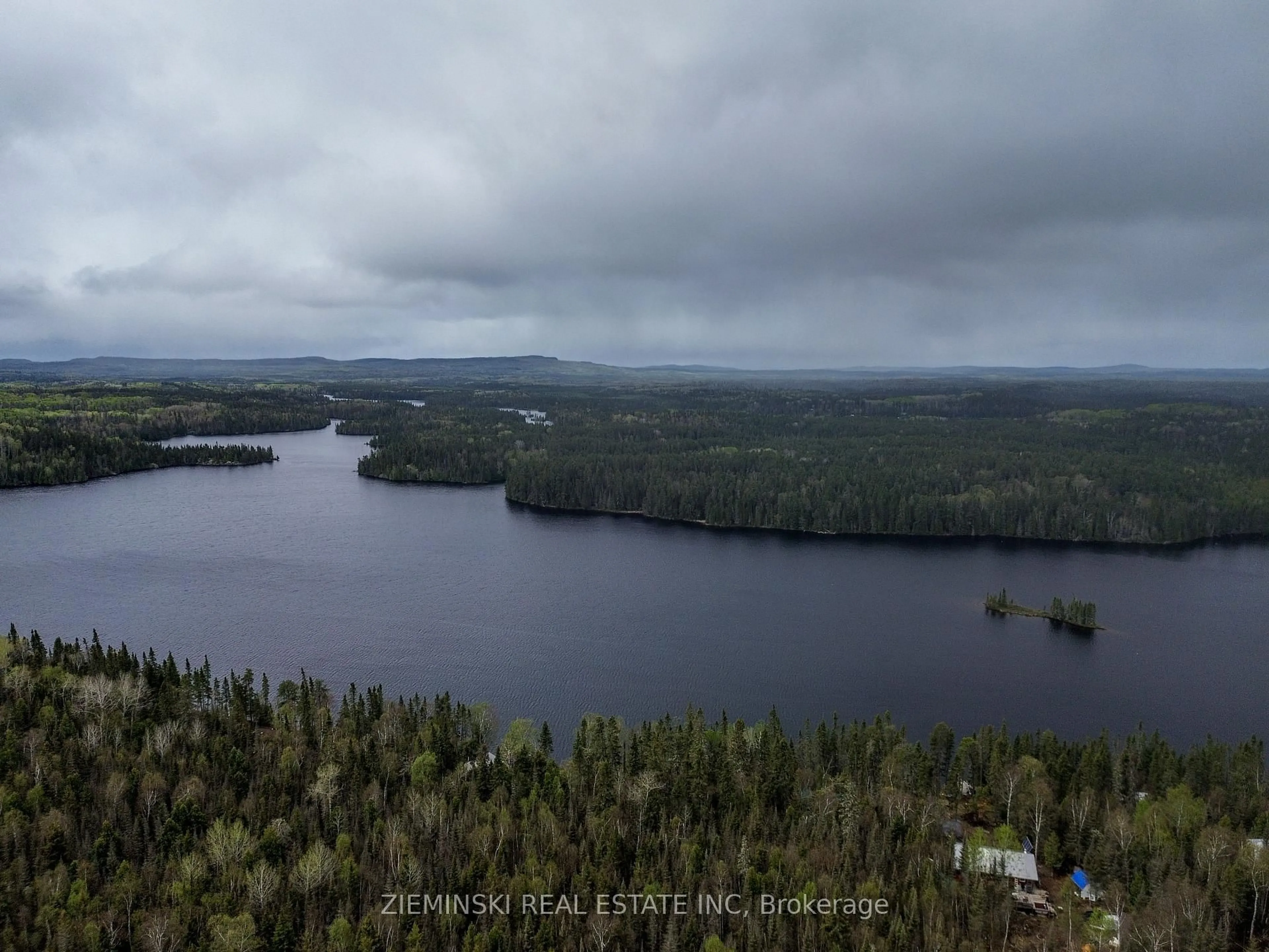 A pic from outside/outdoor area/front of a property/back of a property/a pic from drone, water/lake/river/ocean view for 24217 Parcel, Timiskaming Ontario P0K 1M0