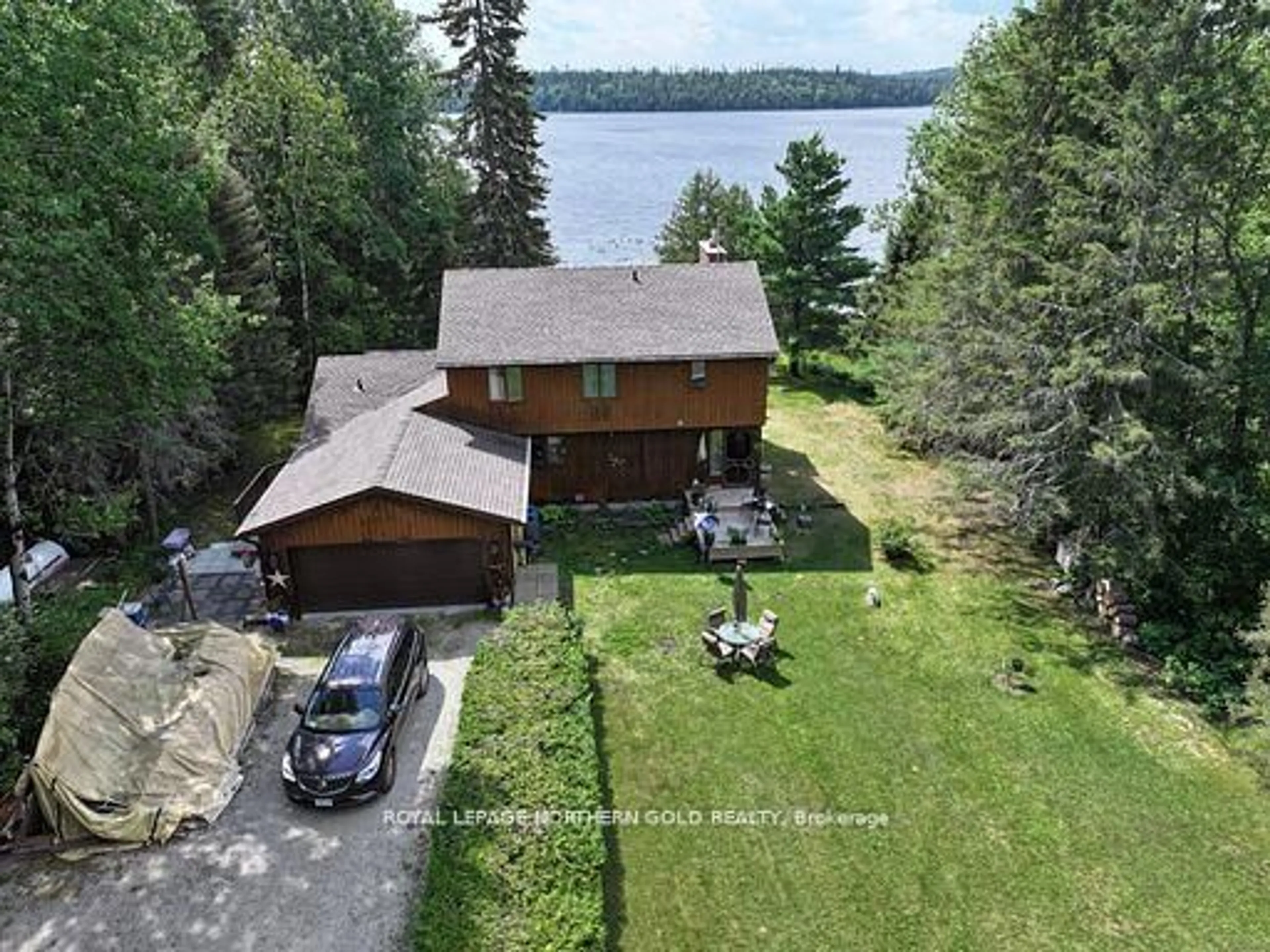 A pic from outside/outdoor area/front of a property/back of a property/a pic from drone, water/lake/river/ocean view for 290 Grenfell Rd, Kirkland Lake Ontario P0K 1T0