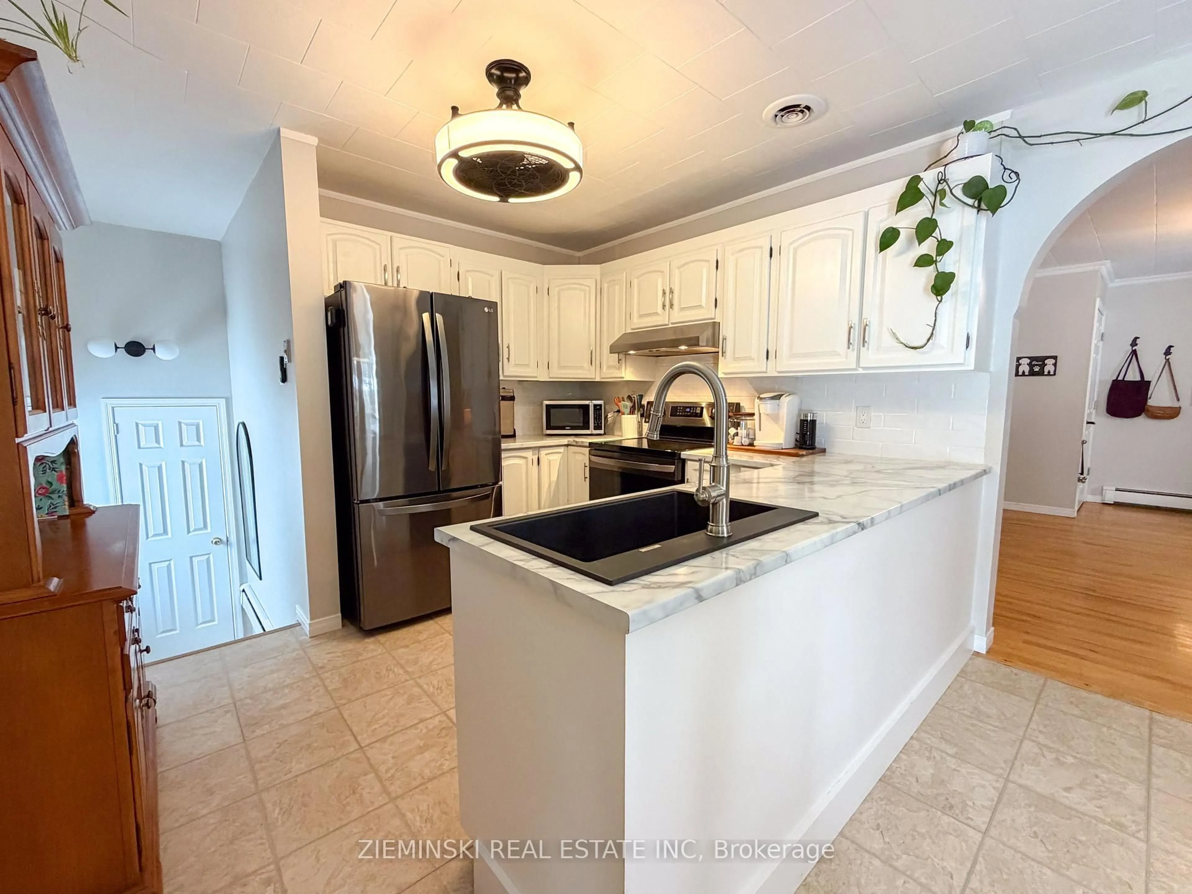 Open concept kitchen, ceramic/tile floor for 637 Montrock St, Iroquois Falls Ontario P0K 1E0