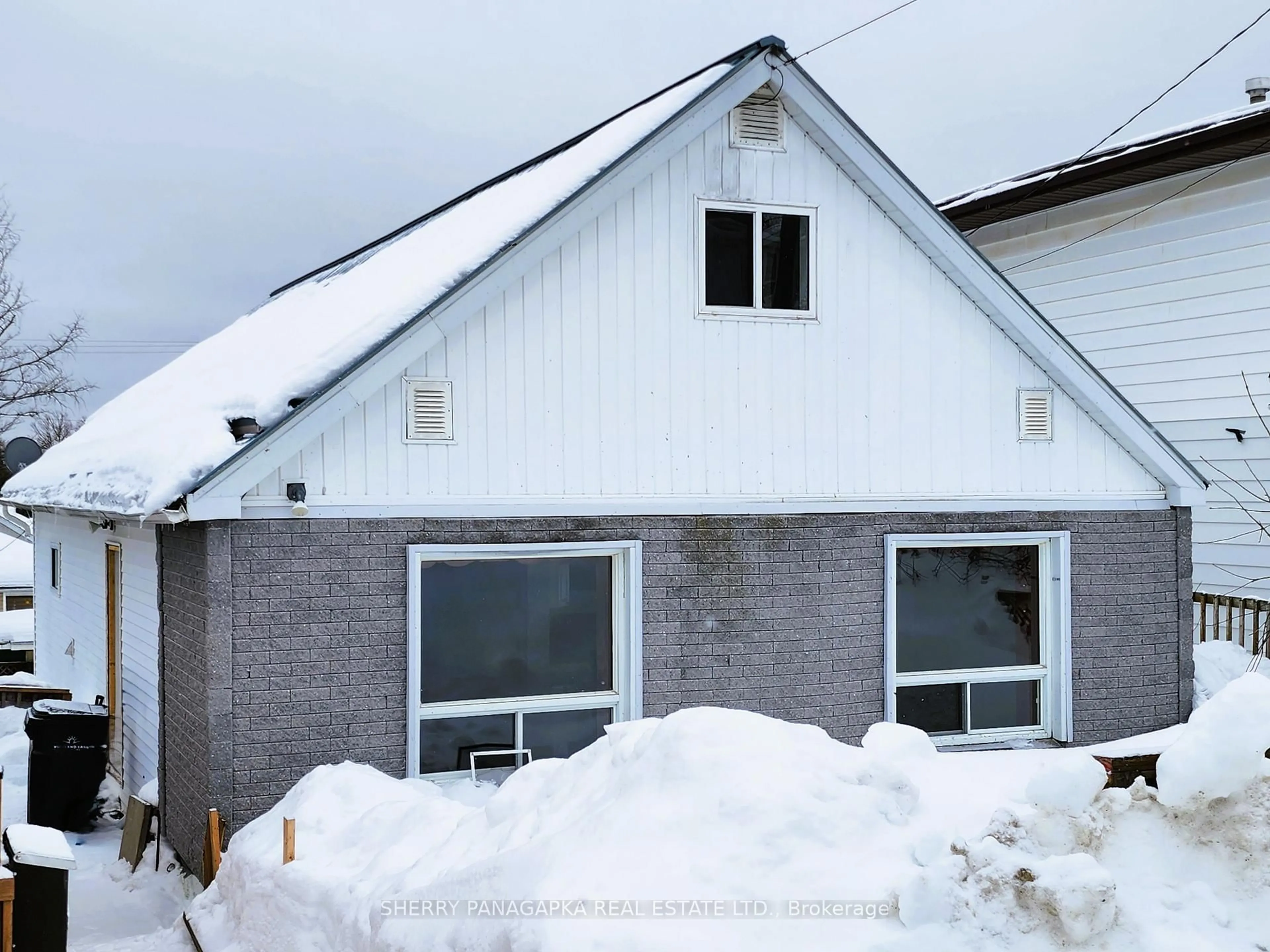 Home with vinyl exterior material, building for 59 Mckelvie Ave, Kirkland Lake Ontario P2N 2K6