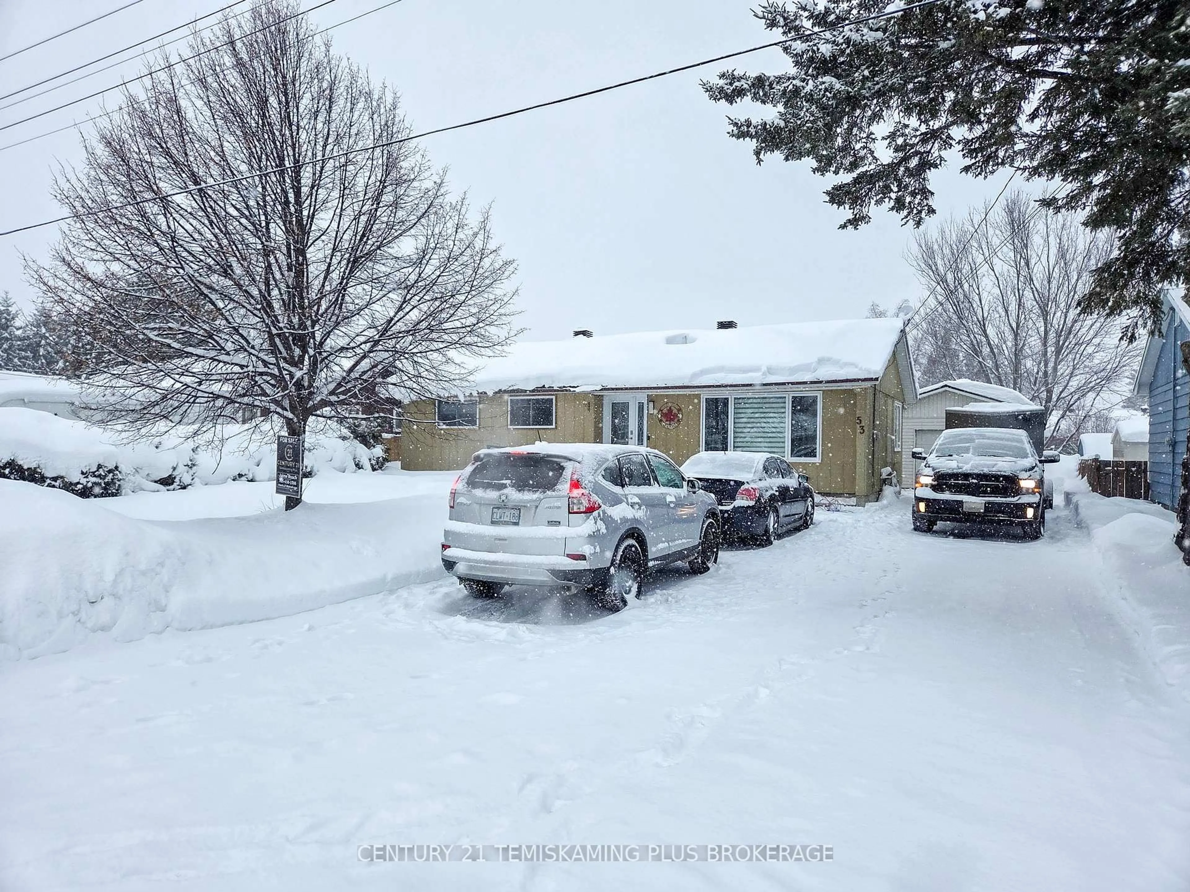 A pic from outside/outdoor area/front of a property/back of a property/a pic from drone, street for 53 Tenth Ave, Englehart Ontario P0J 1H0