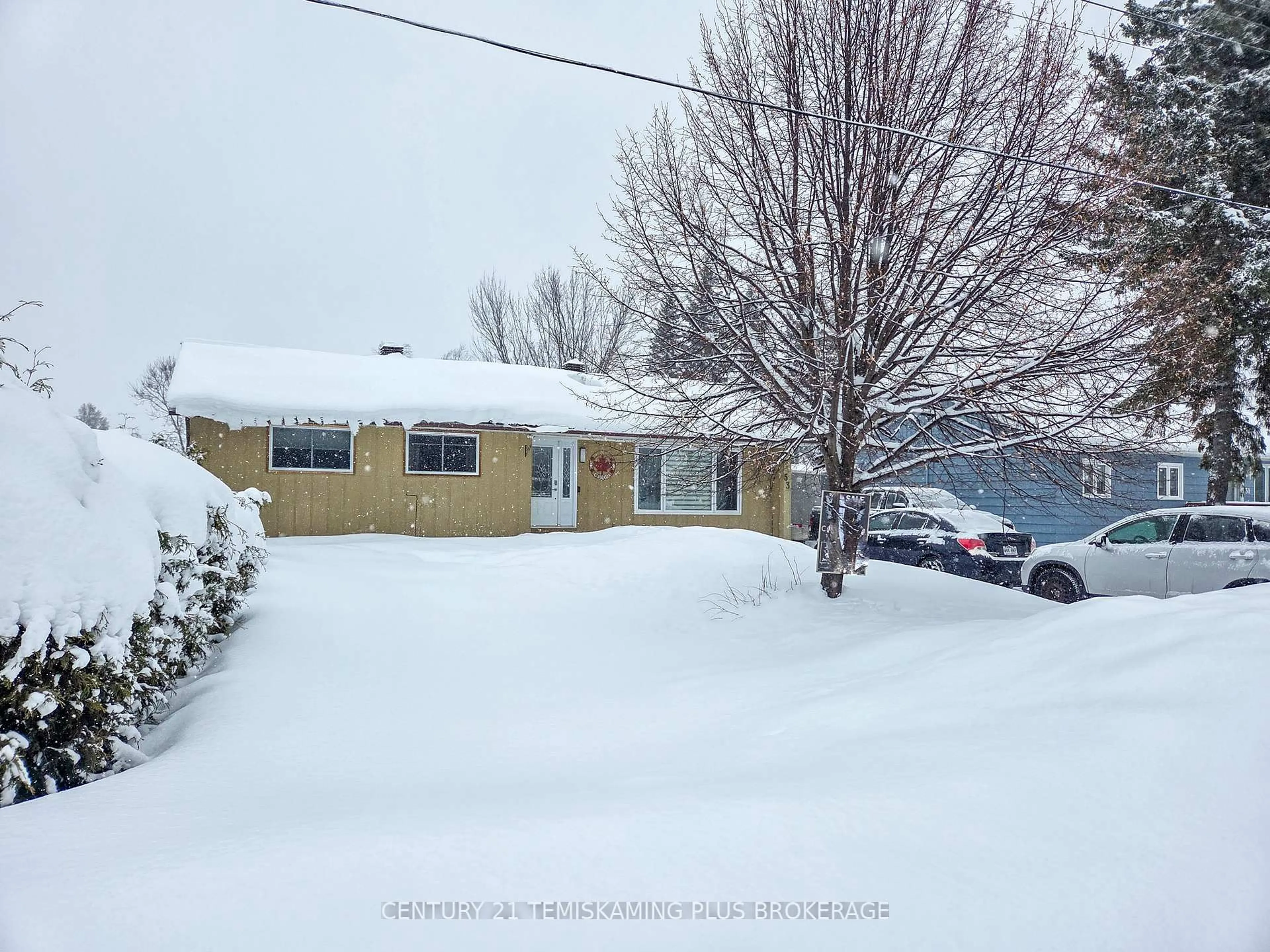 A pic from outside/outdoor area/front of a property/back of a property/a pic from drone, street for 53 Tenth Ave, Englehart Ontario P0J 1H0