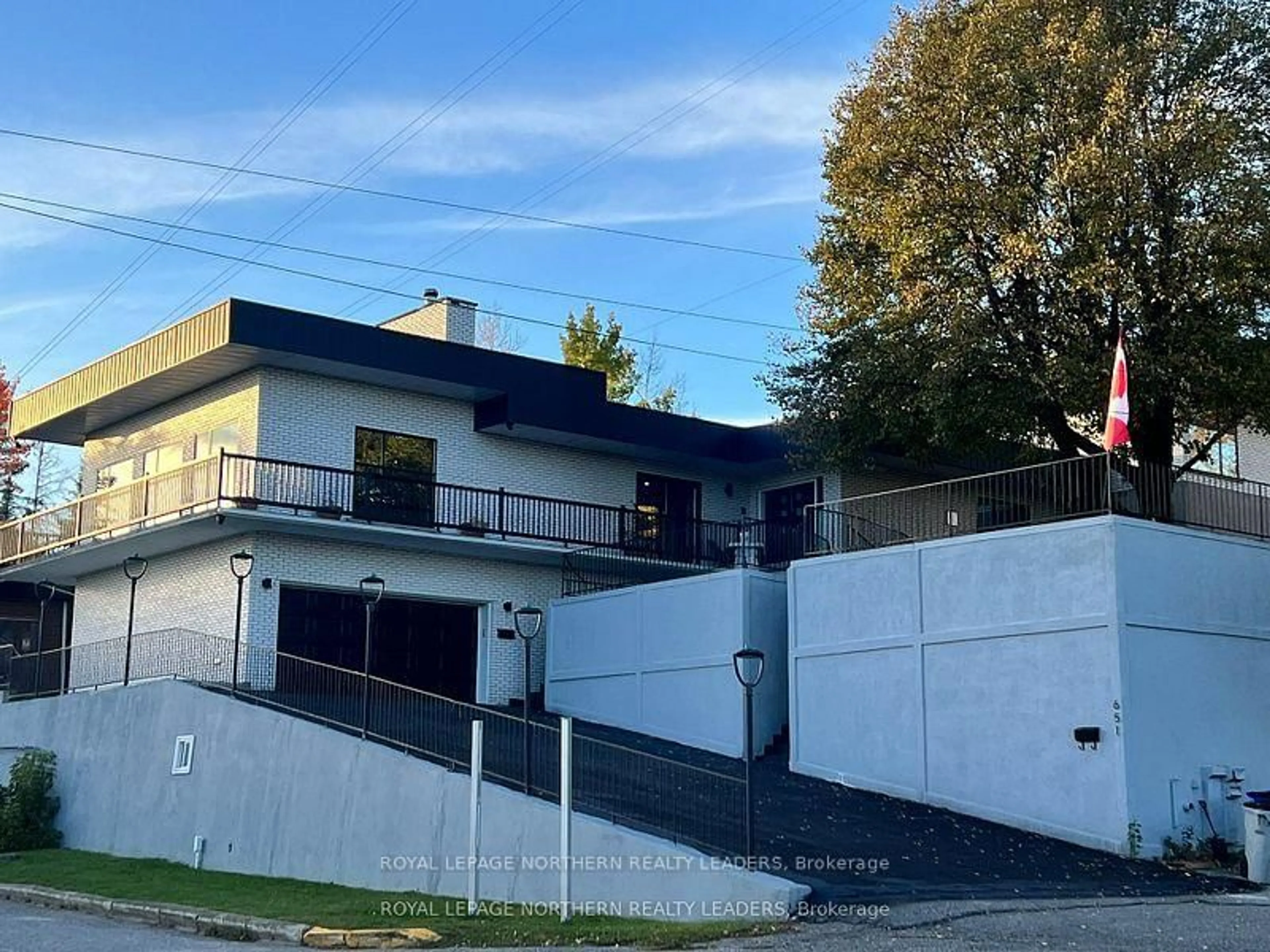 A pic from outside/outdoor area/front of a property/back of a property/a pic from drone, street for 651 Cedar St, Timmins Ontario P4N 7Y5