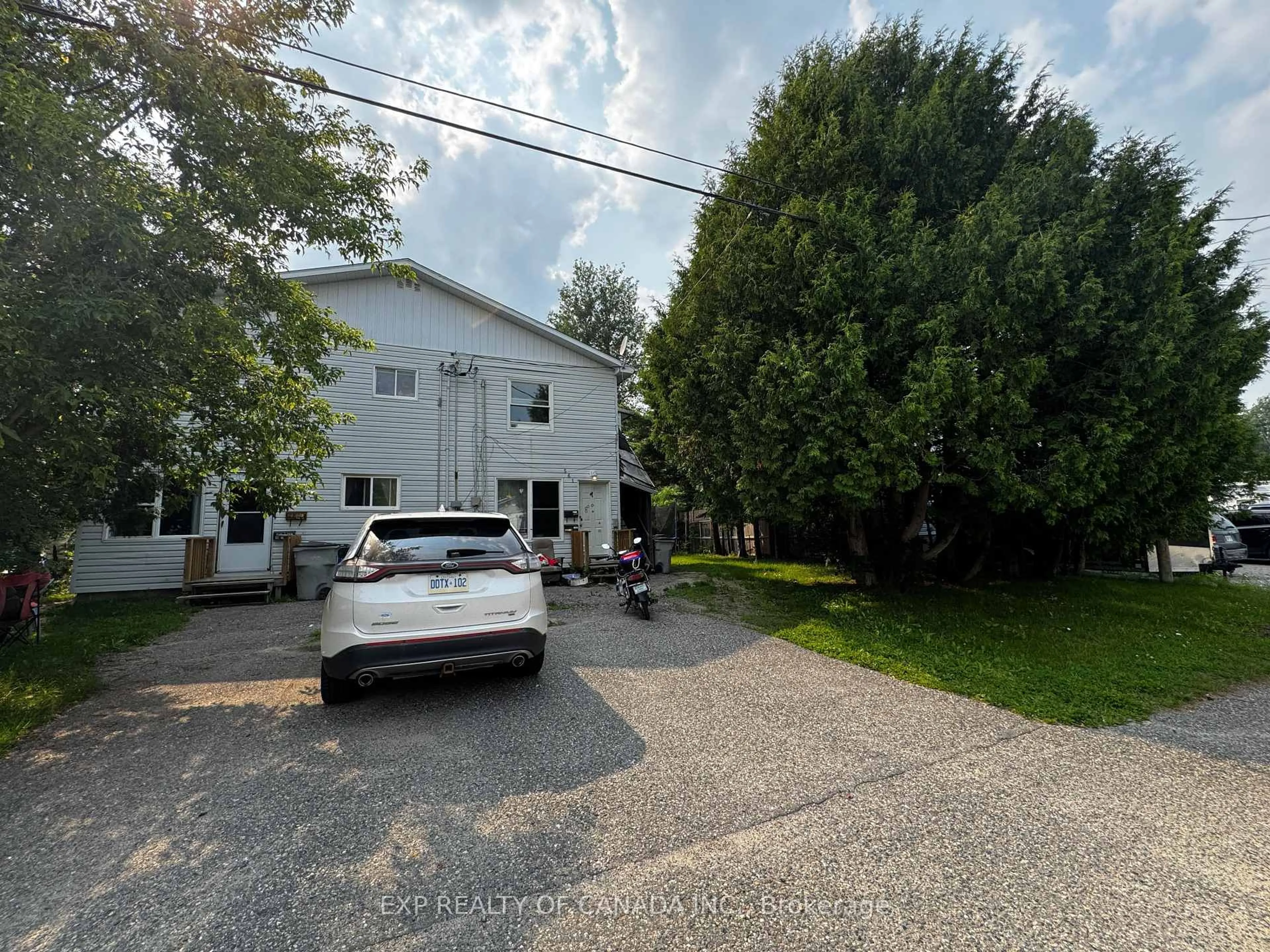 A pic from outside/outdoor area/front of a property/back of a property/a pic from drone, street for 557 Norman St, Timmins Ontario P4N 4C1